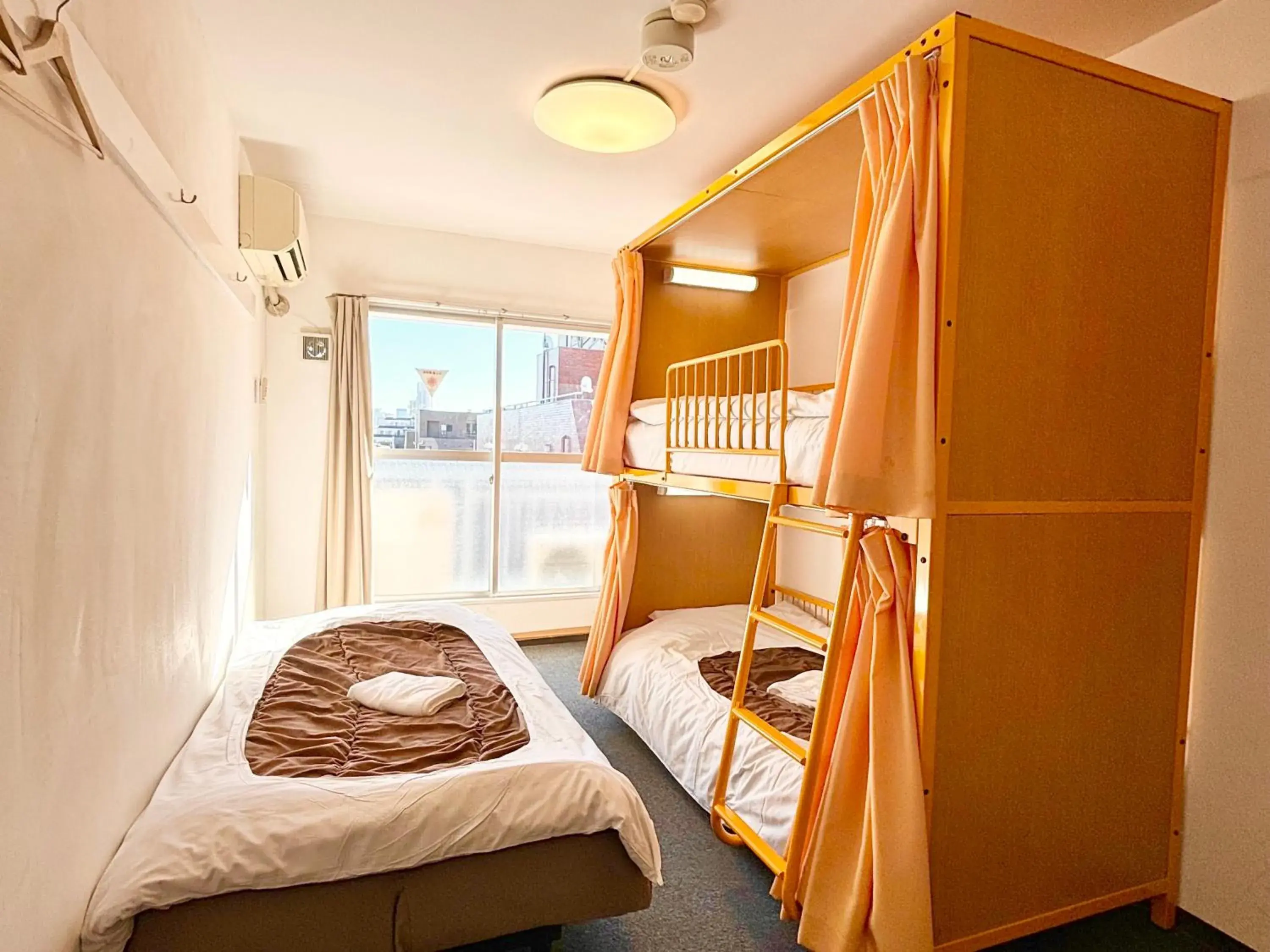 Bed in Sakura Hotel Nippori Bed in Sakura Hotel Nippori