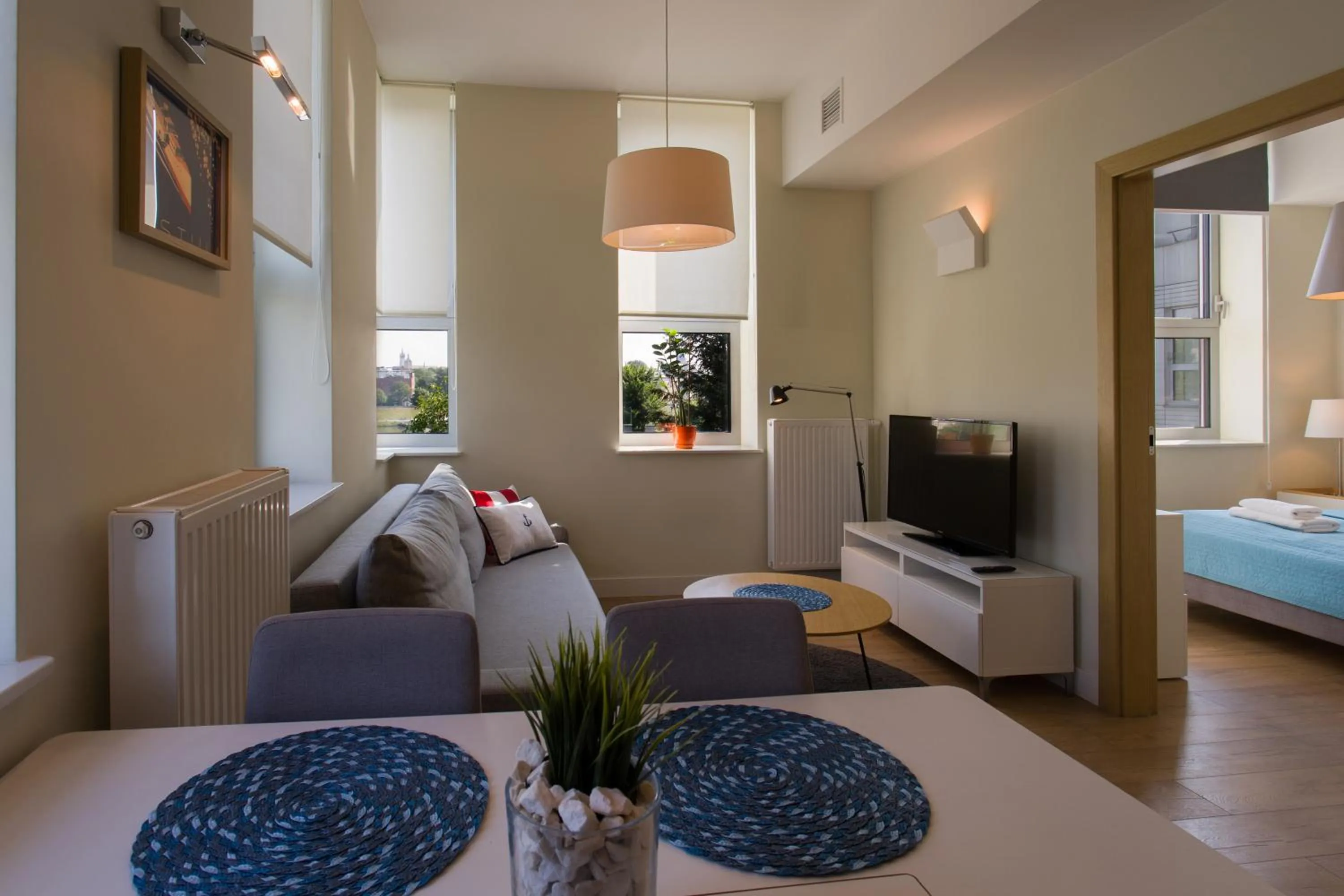 Living room, Bed in Riverside Aparthotel Cracow