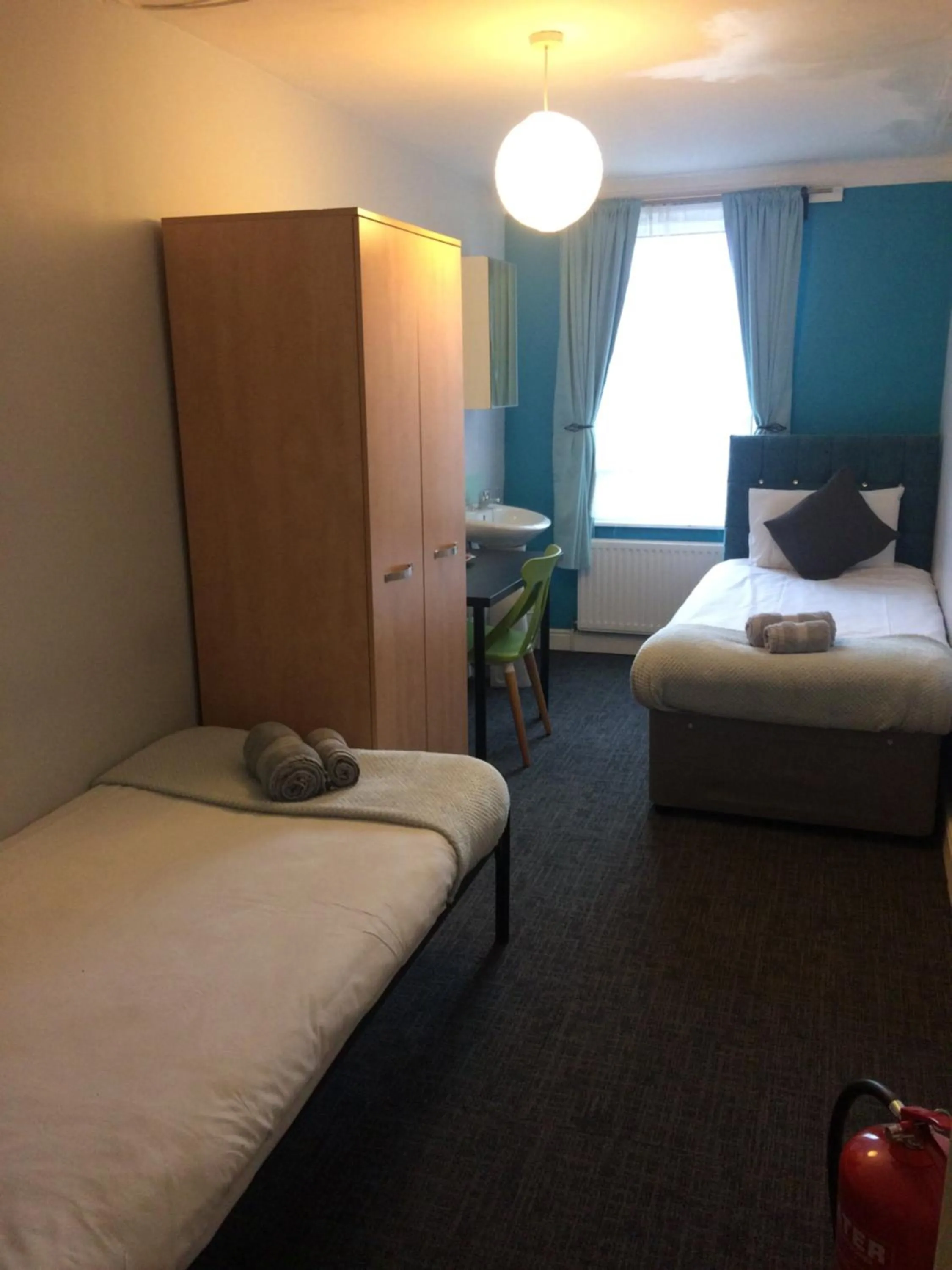 Bed in Queens Guesthouse Manchester