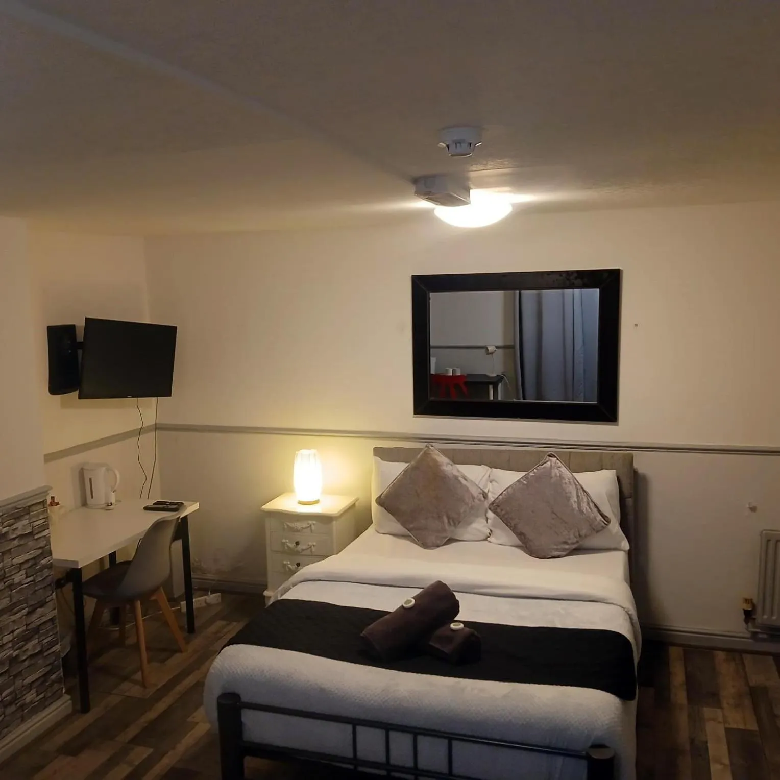 Bed in Queens Guesthouse Manchester