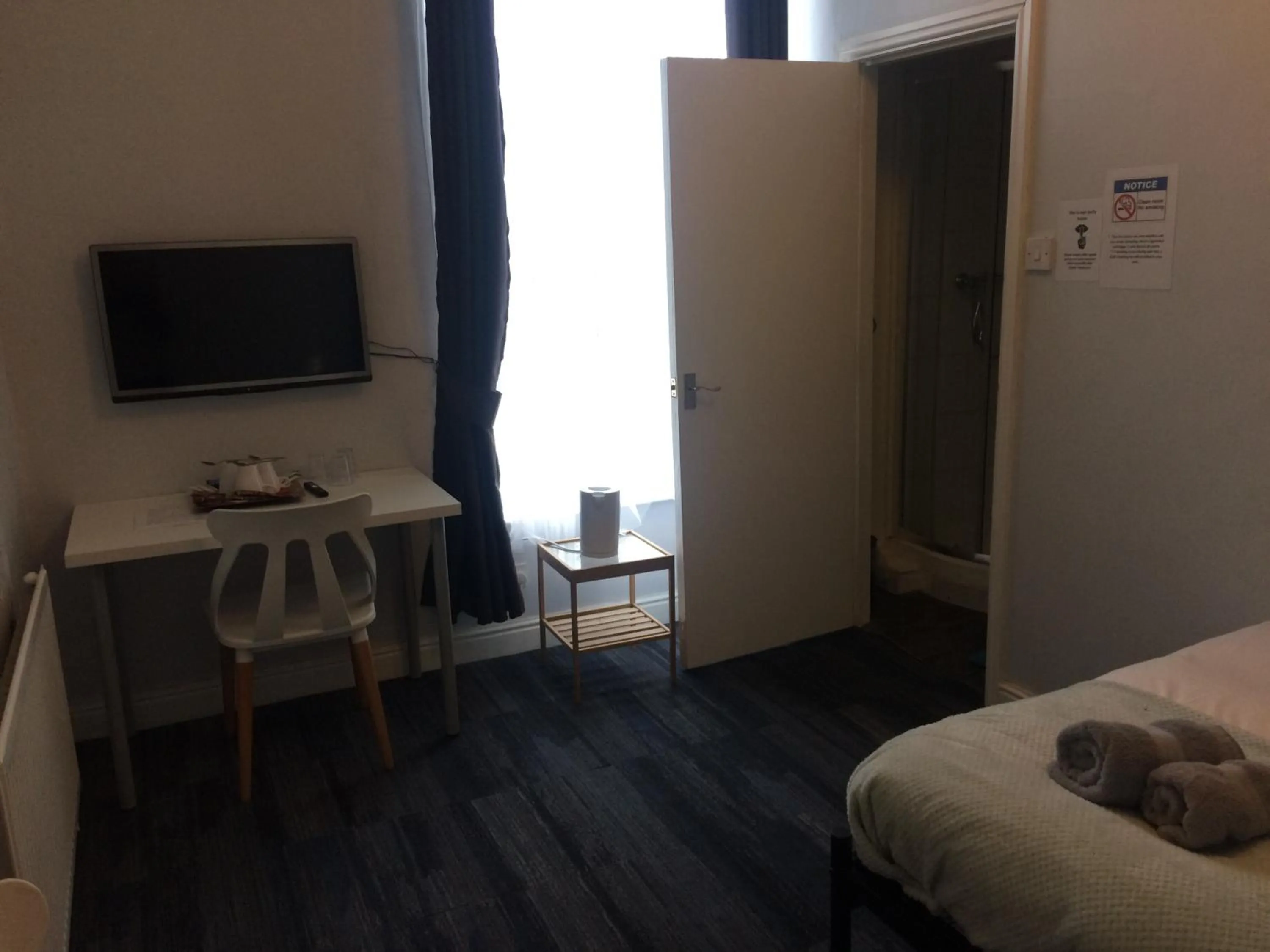 Bed in Queens Guesthouse Manchester