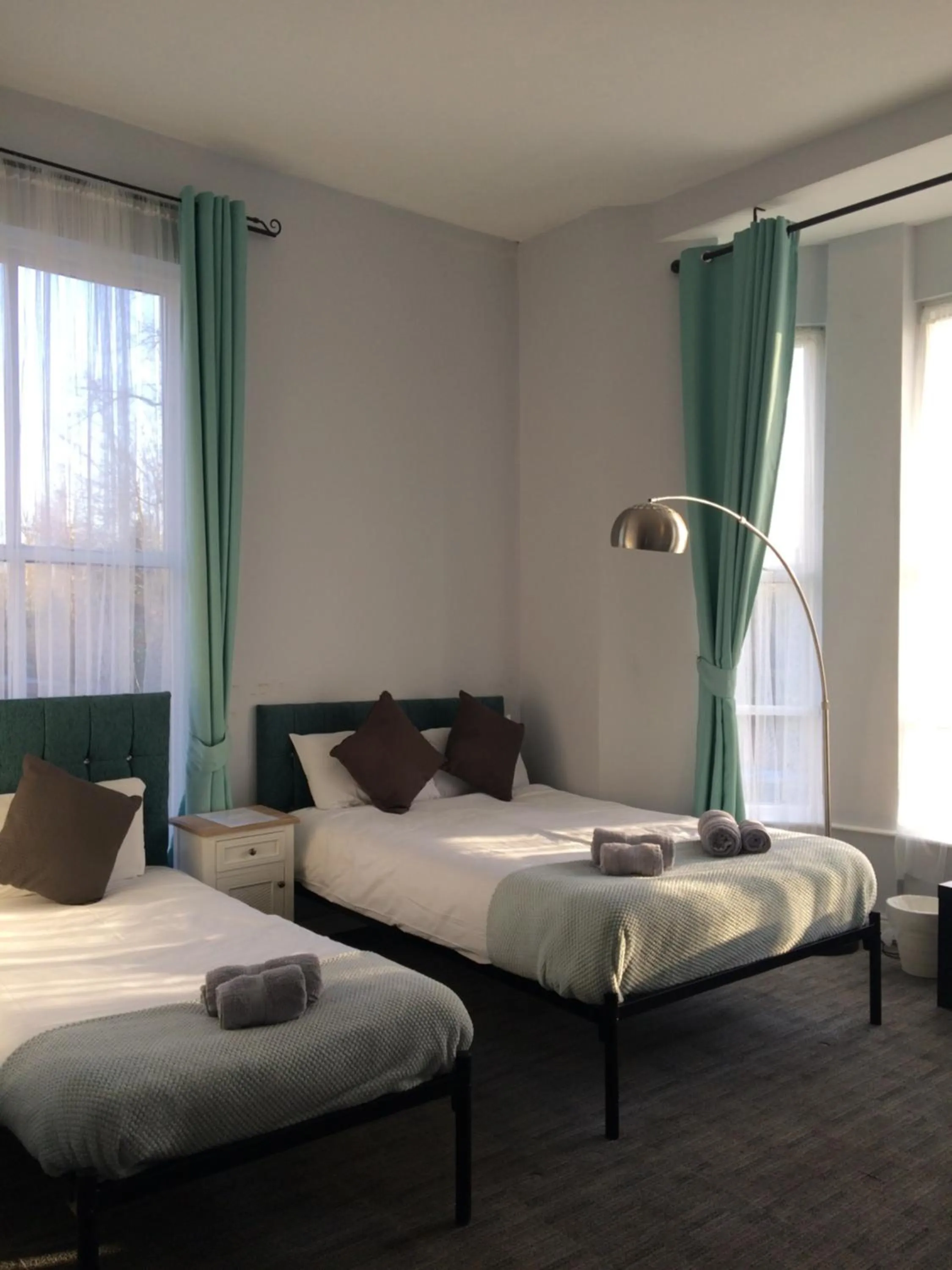 Bed in Queens Guesthouse Manchester