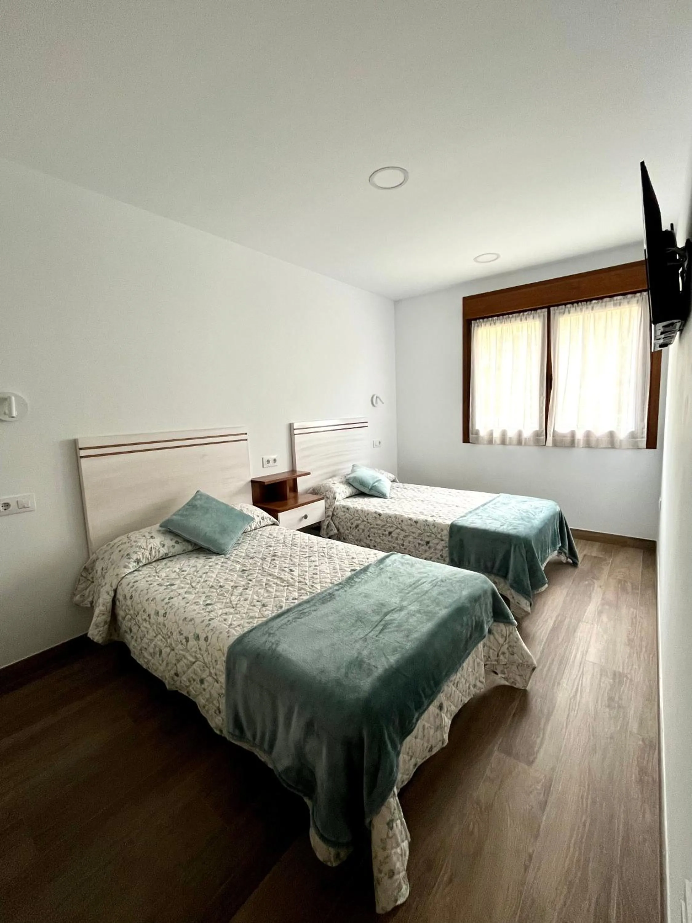 TV and multimedia, Bed in Apartamentos Valbuena
