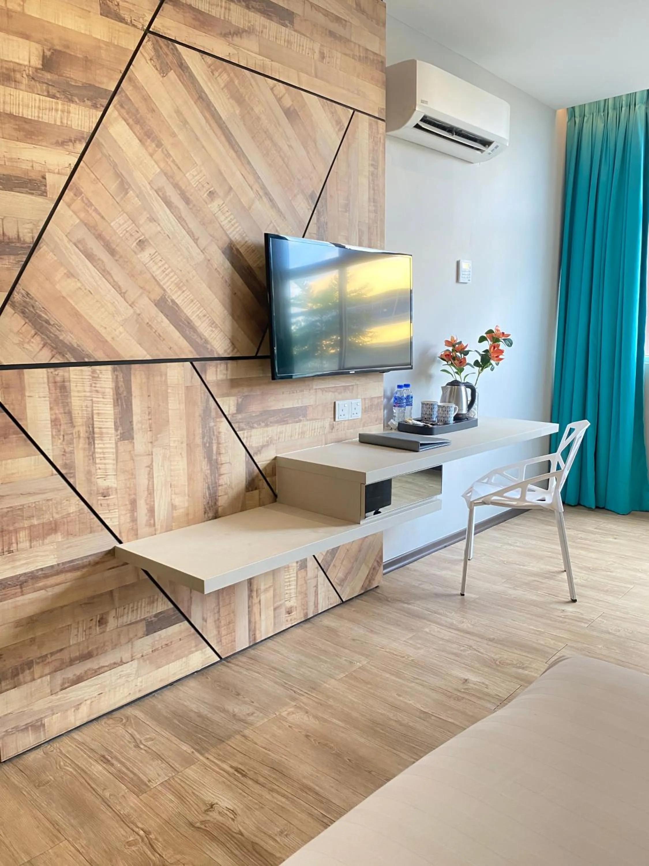 TV and multimedia in G5 HOTEL AND SERVICED APARTMENT