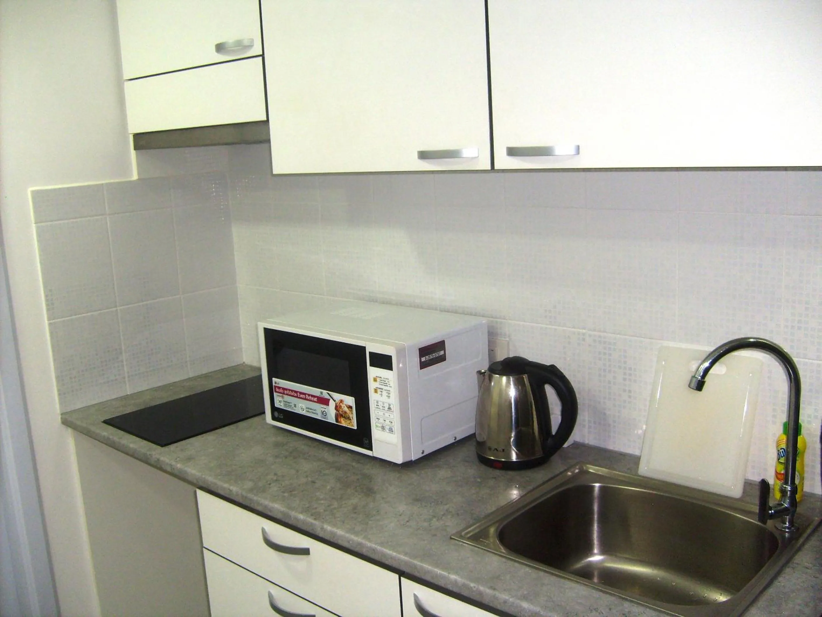 Kitchen or kitchenette in Tropical Garden Studio