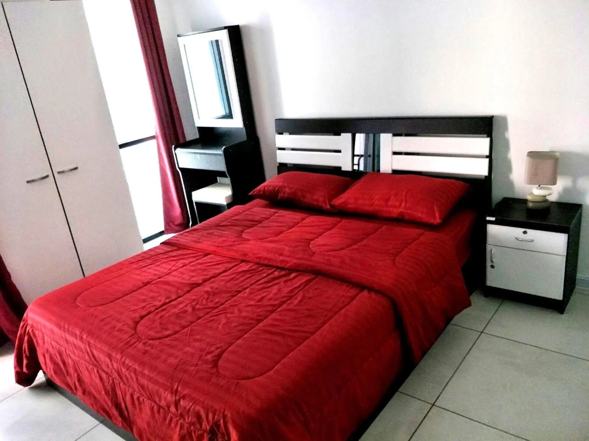 Bed in Tropical Garden Studio