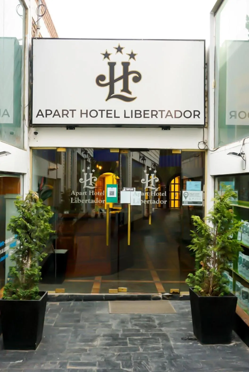 Property logo or sign in Apart Hotel Libertador