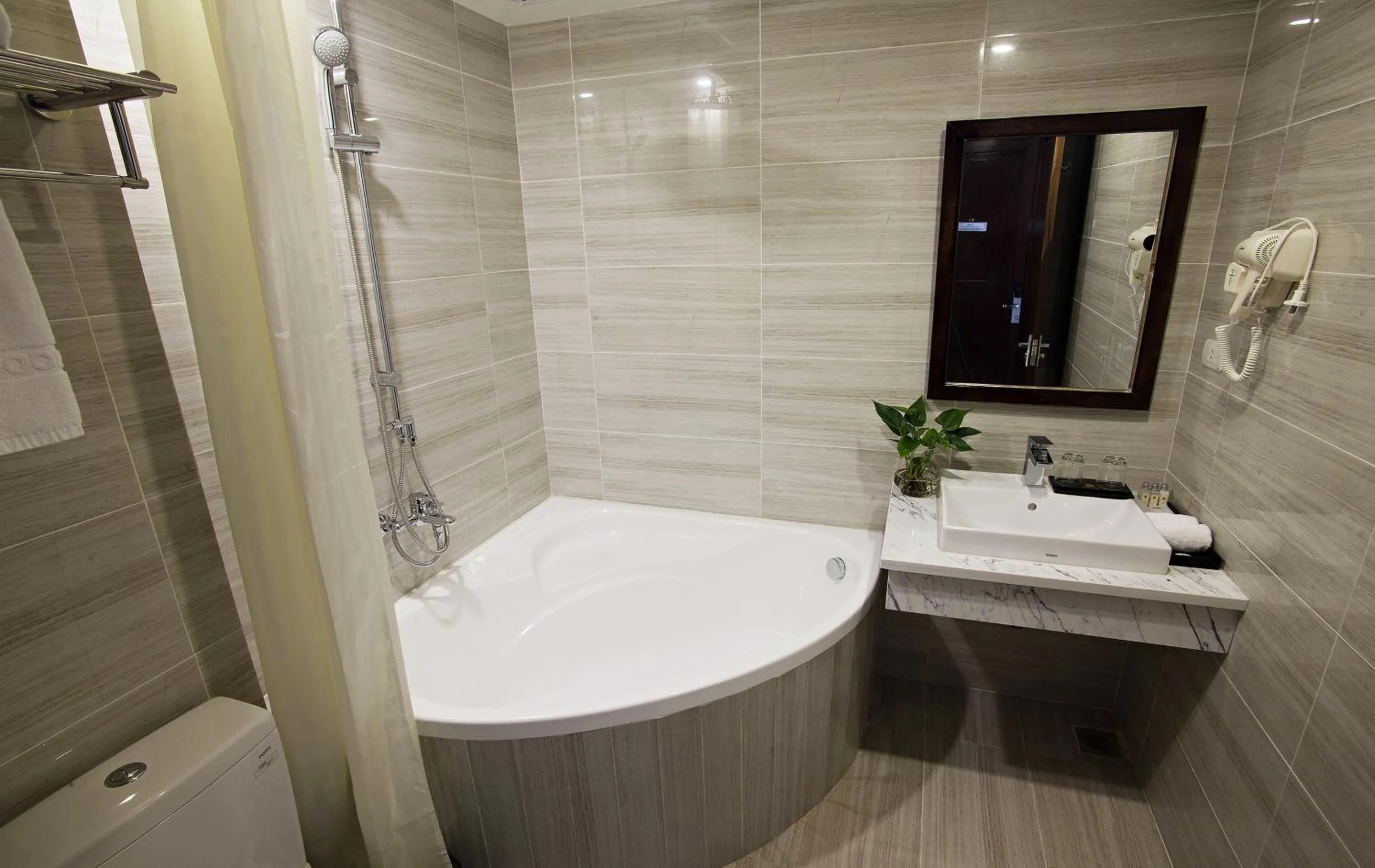 Bathroom in Inearth Hotel - 华夏商务酒店