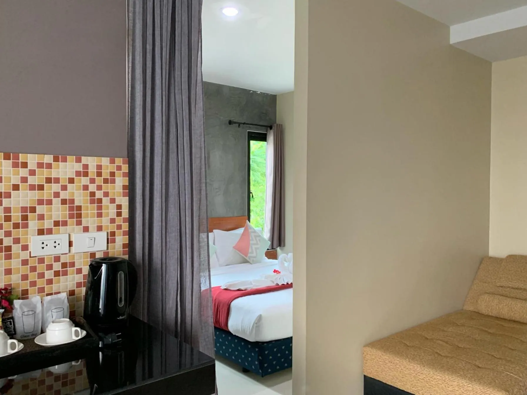 Bed in Isayarada Apartment