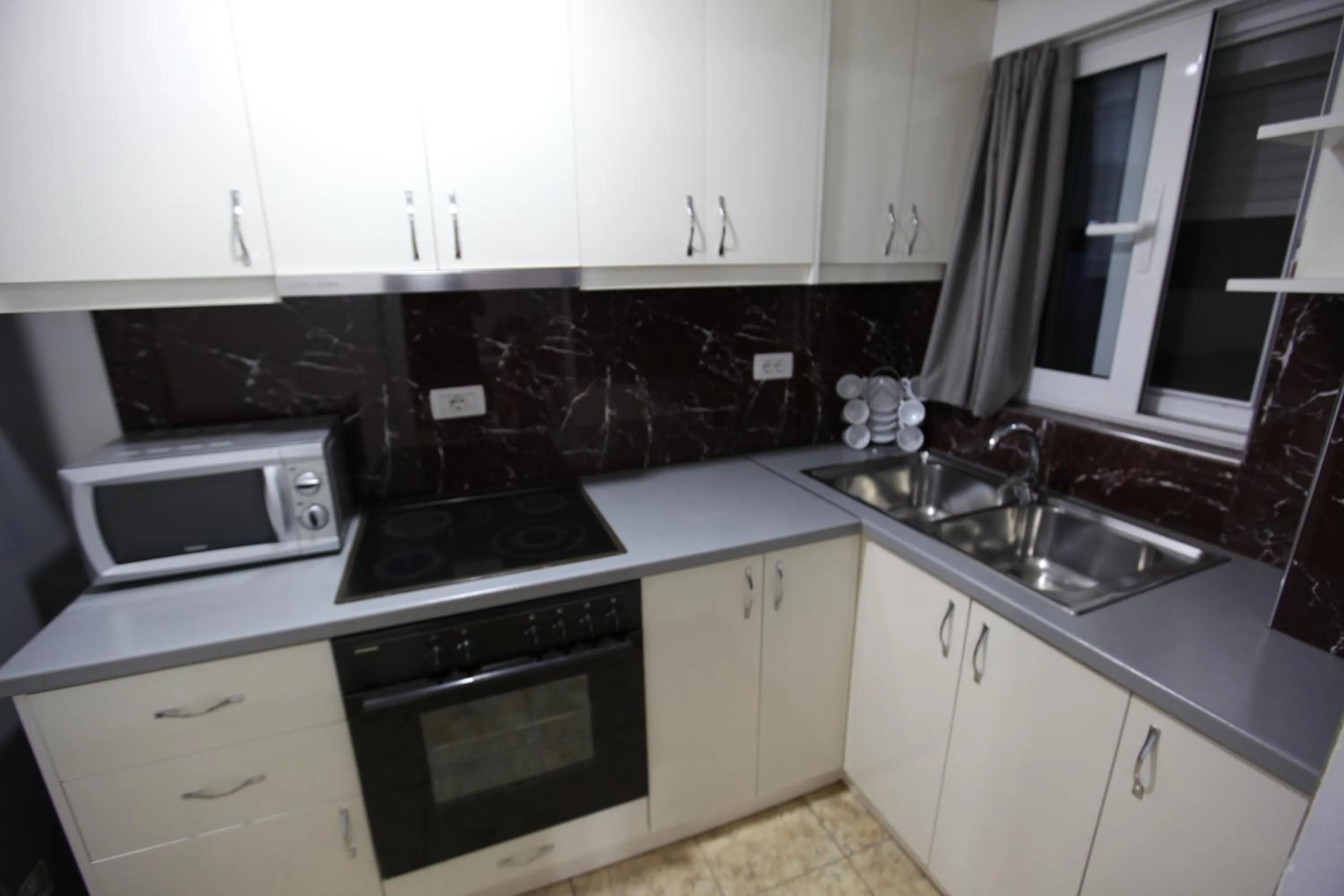 Kitchen or kitchenette in Kuburi Hotel