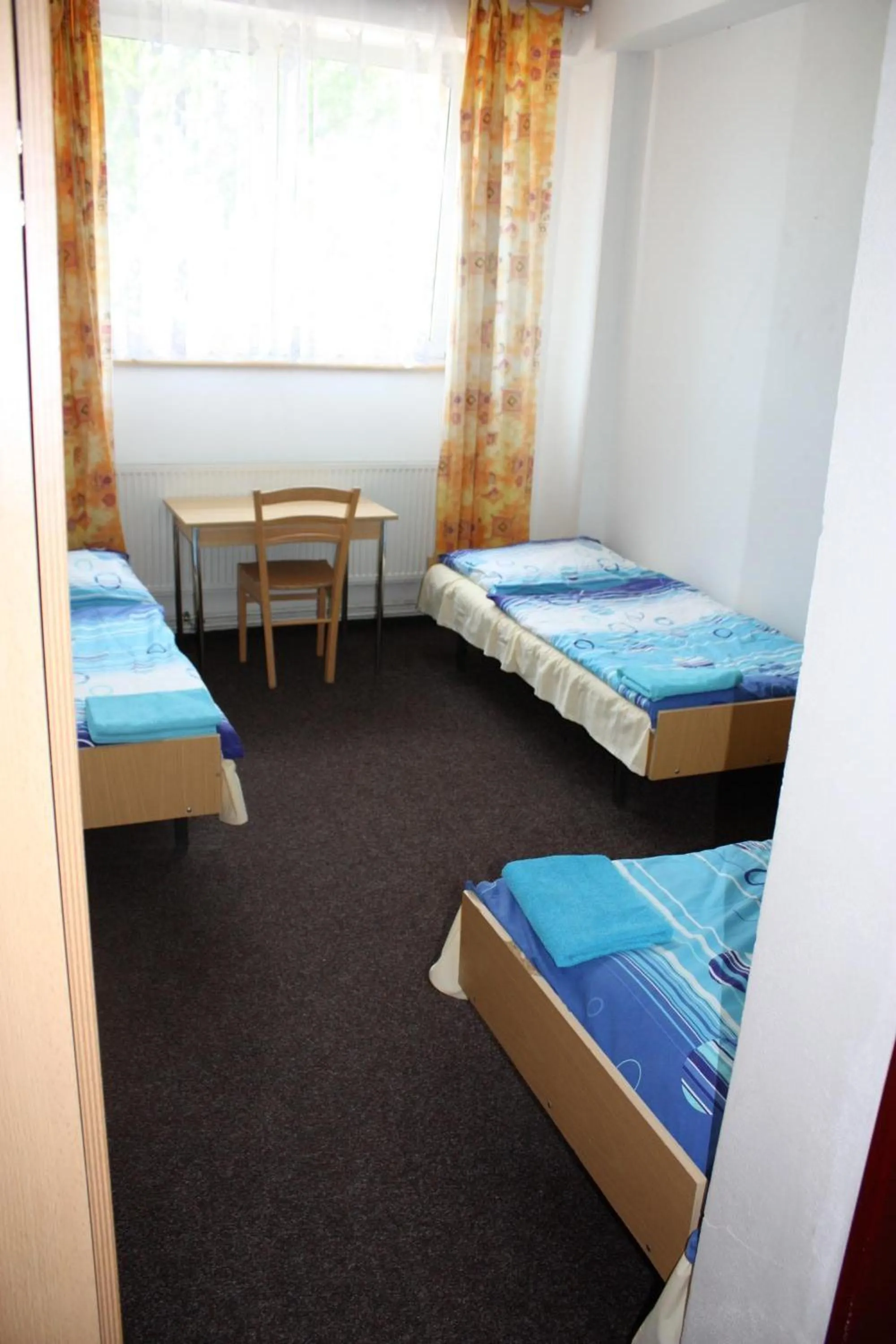 Photo of the whole room, Bed in Sporthotel BK Pod Lipou