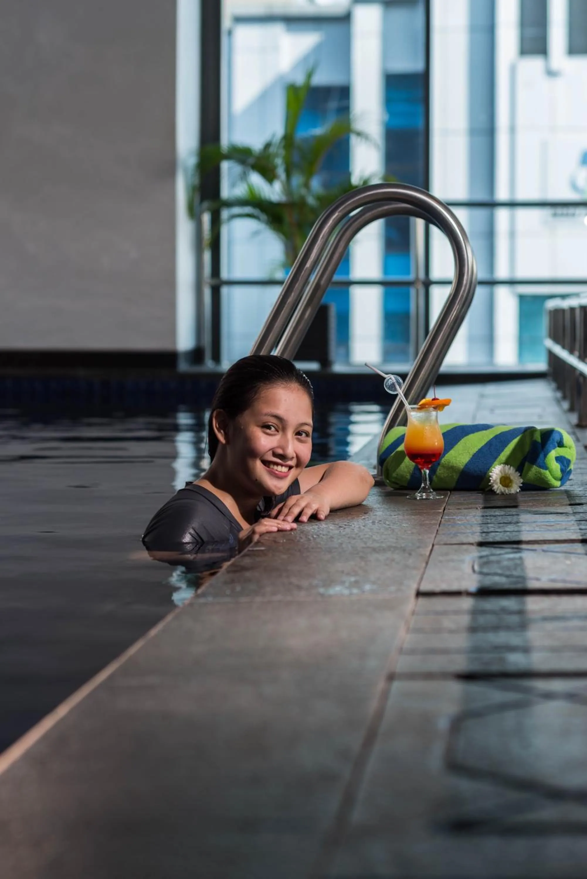 Swimming pool in Arthama Hotels Makassar