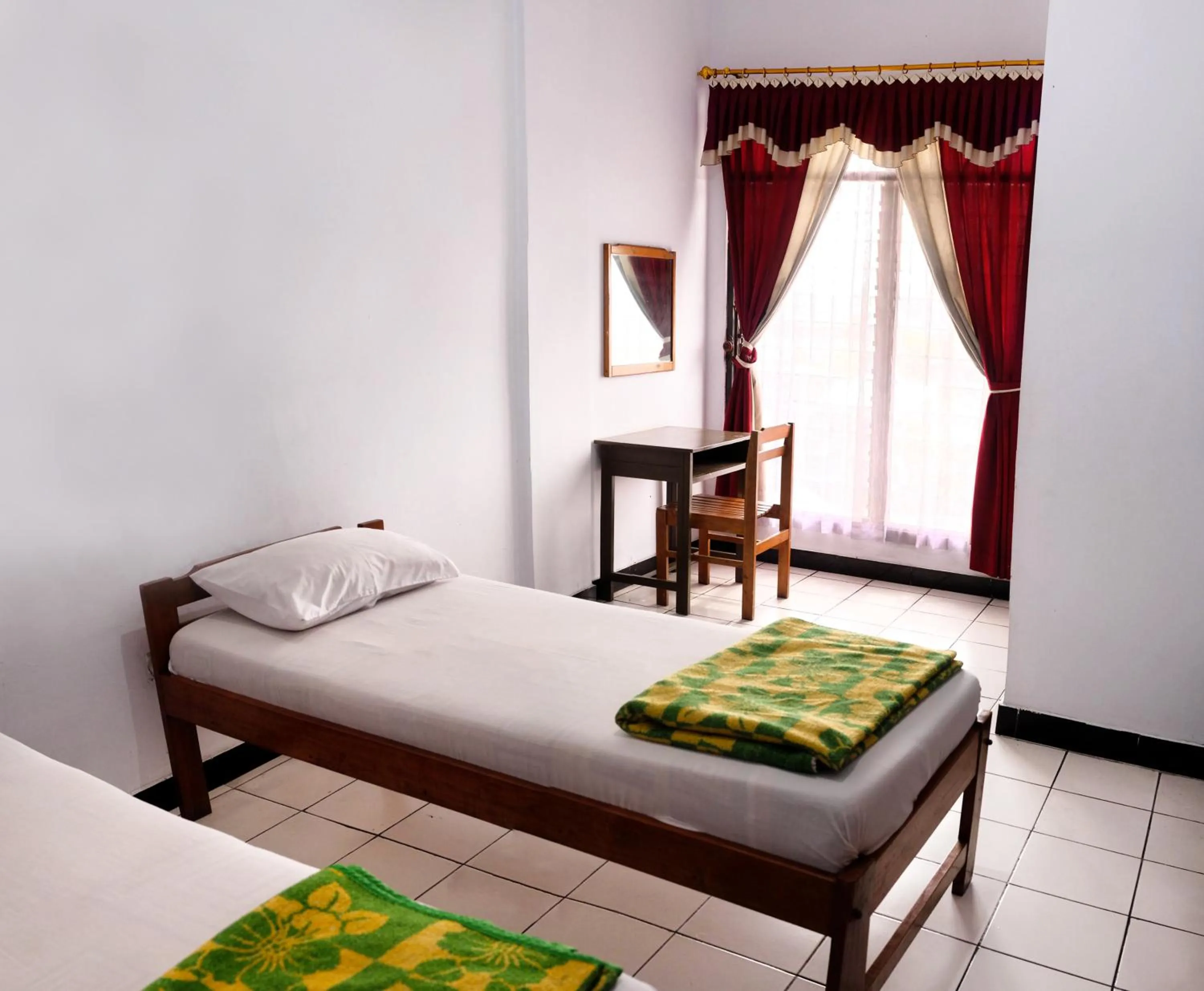 Bedroom, Bed in Hotel Wisata