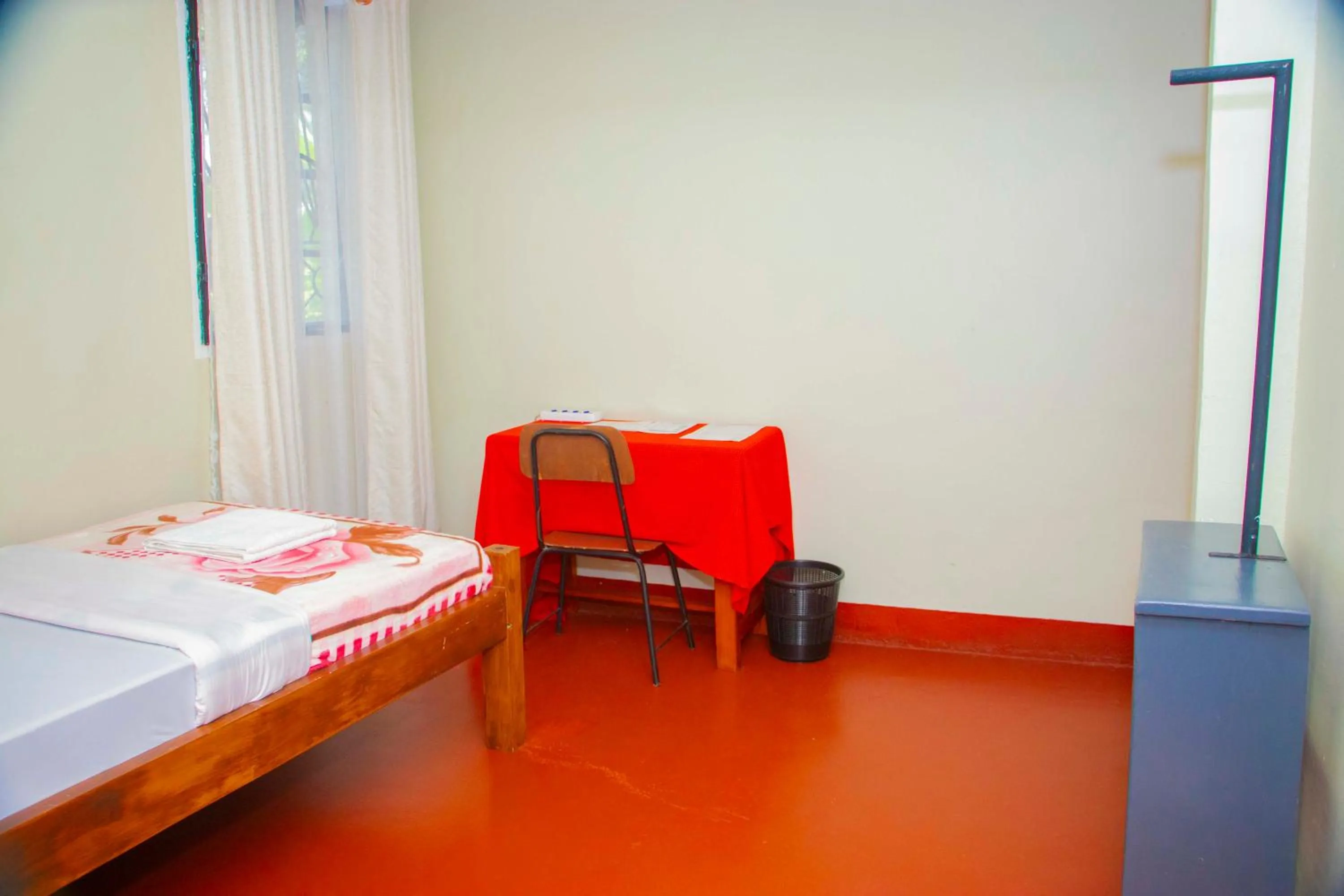 Bed in Endasawa Tree Lodge