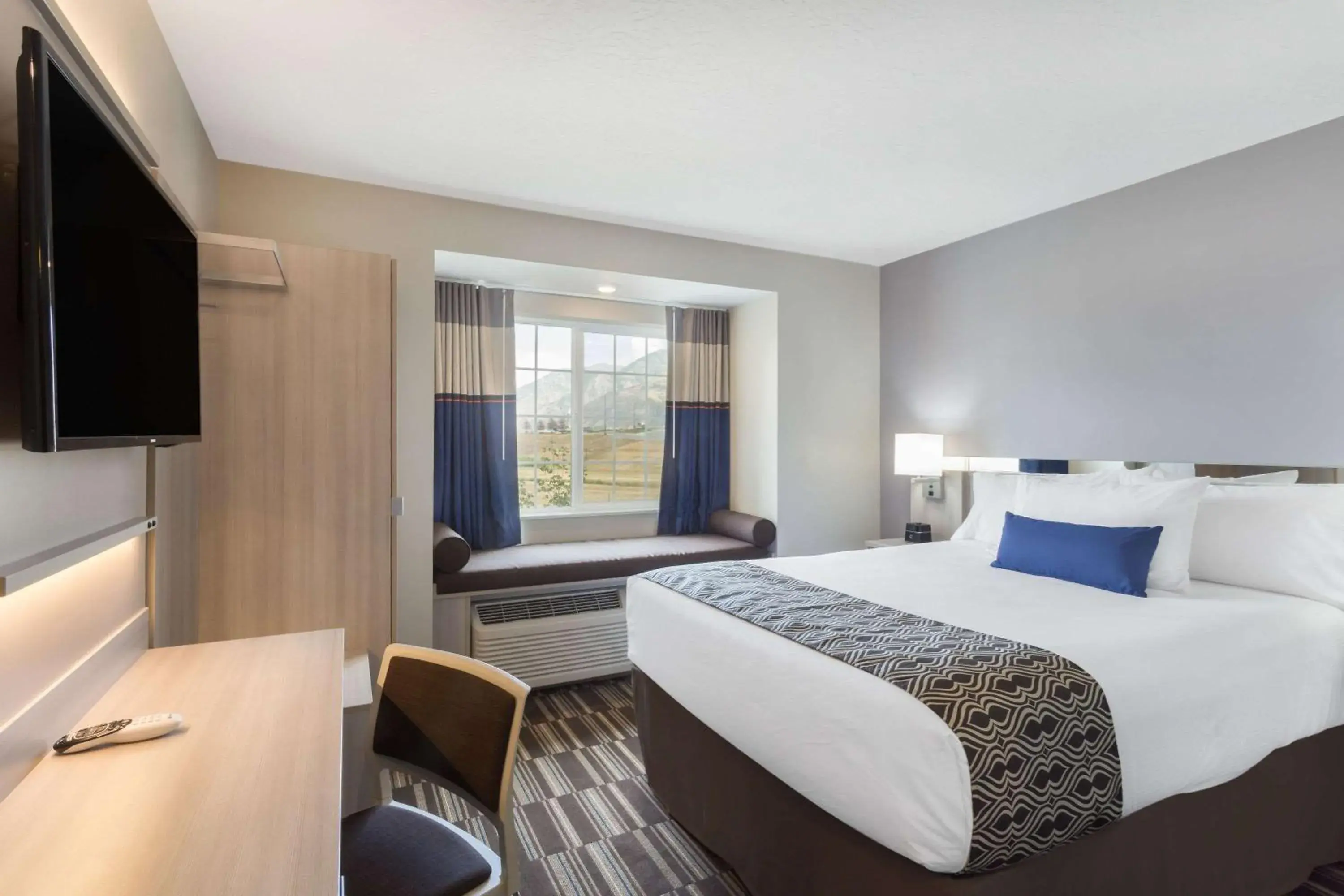 Photo of the whole room, Bed in Microtel Inn & Suites by Wyndham Springville Photo of the whole room, Bed in Microtel Inn & Suites by Wyndham Springville