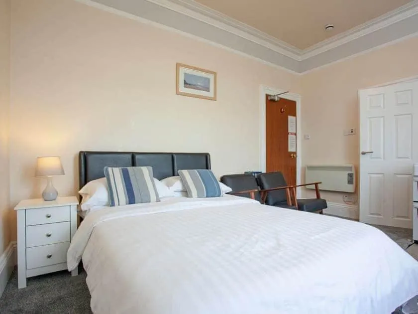 Bed in Bedford Holiday Apartments