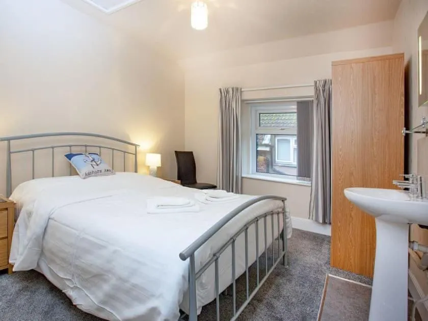 Bed in Bedford Holiday Apartments