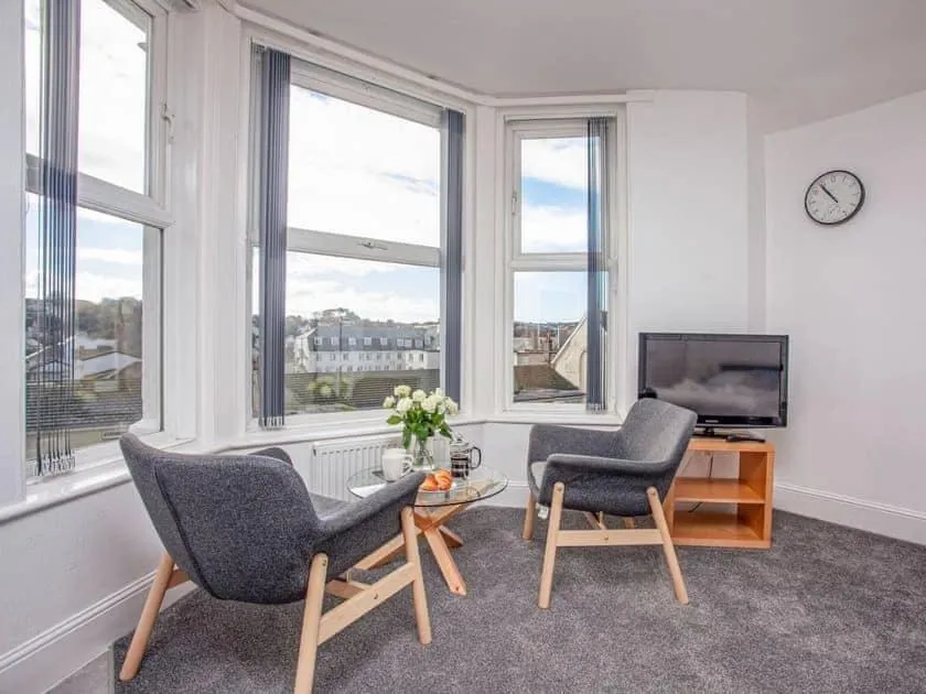 Seating area in Bedford Holiday Apartments