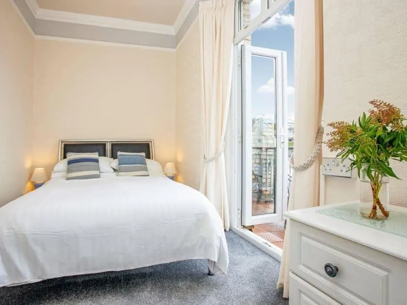 Bed in Bedford Holiday Apartments