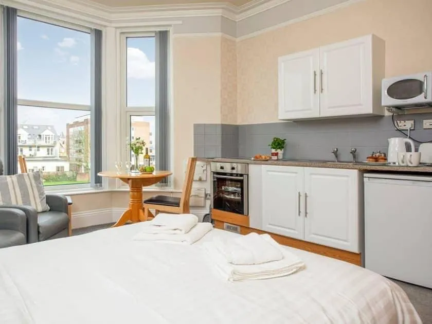 Bed in Bedford Holiday Apartments