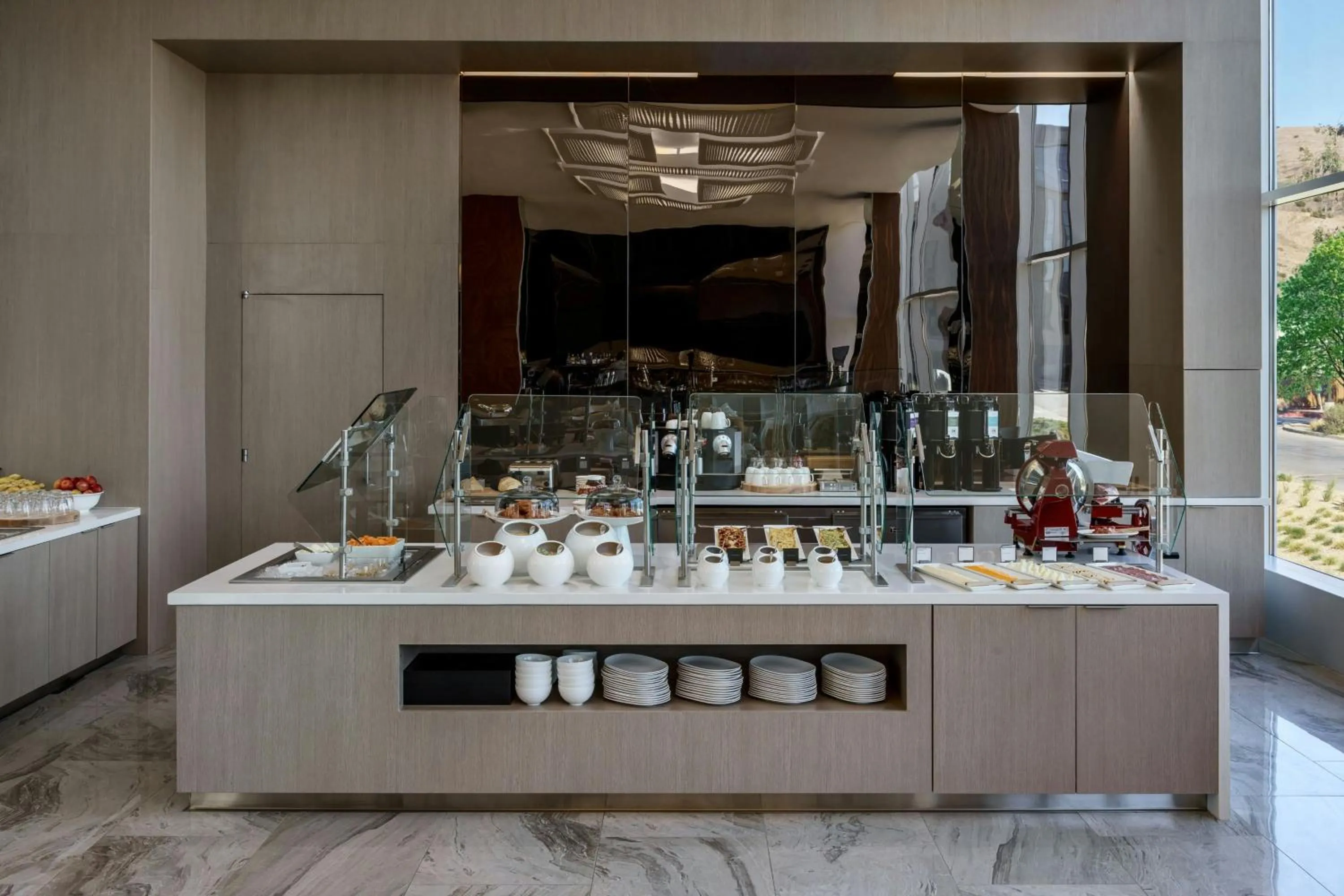 Kitchen or kitchenette in AC Hotel by Marriott San Francisco Airport/Oyster Point Waterfront