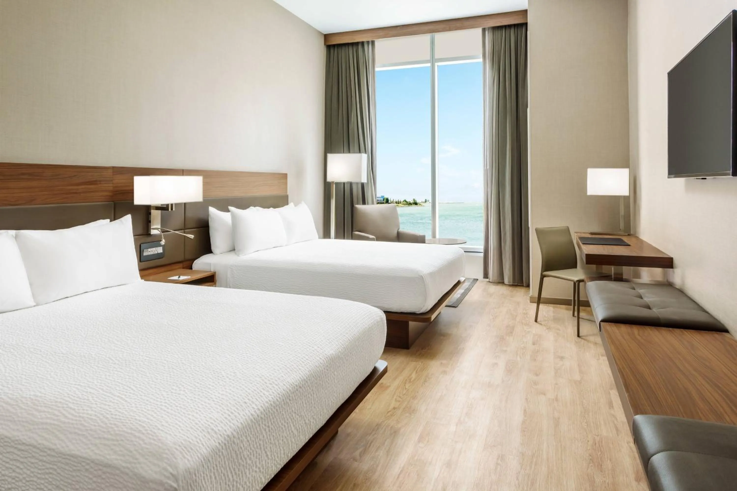 Photo of the whole room, Bed in AC Hotel by Marriott San Francisco Airport/Oyster Point Waterfront