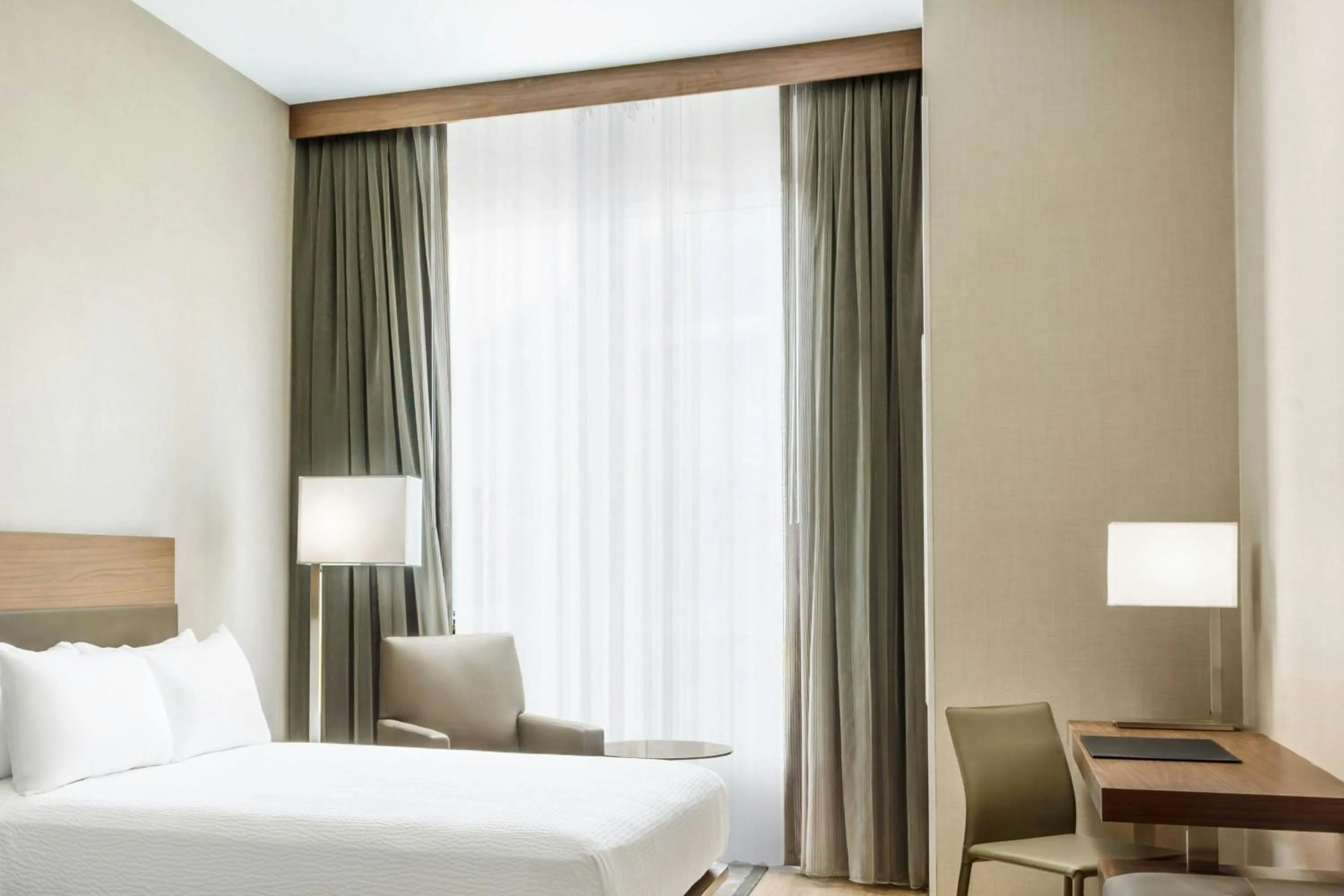 Photo of the whole room, Bed in AC Hotel by Marriott San Francisco Airport/Oyster Point Waterfront