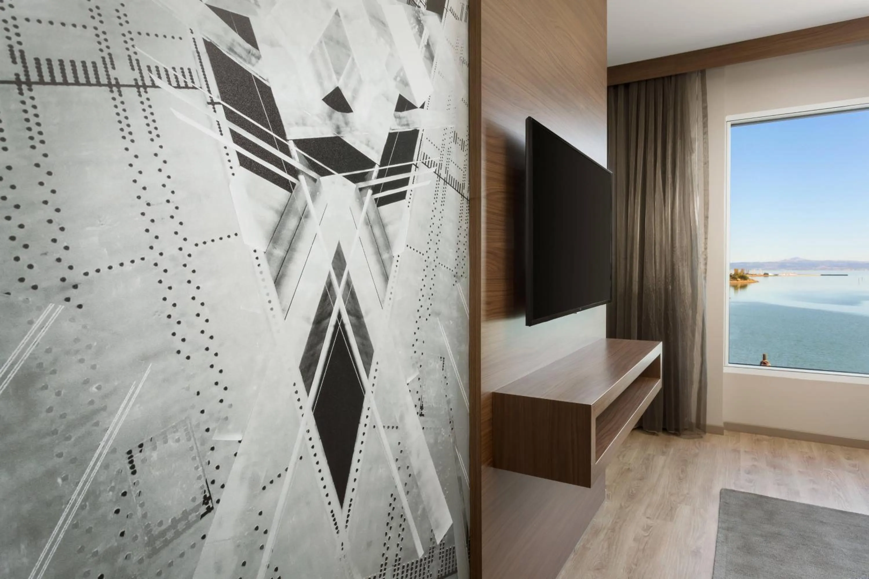 Photo of the whole room, Bed in AC Hotel by Marriott San Francisco Airport/Oyster Point Waterfront