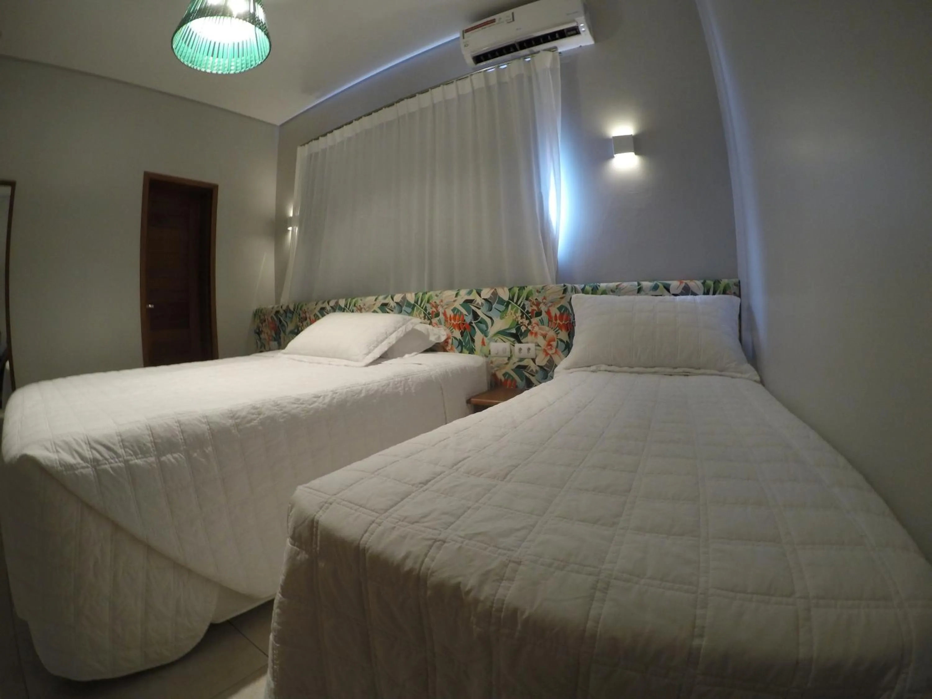 Bed in Pousada Nascer do Sol