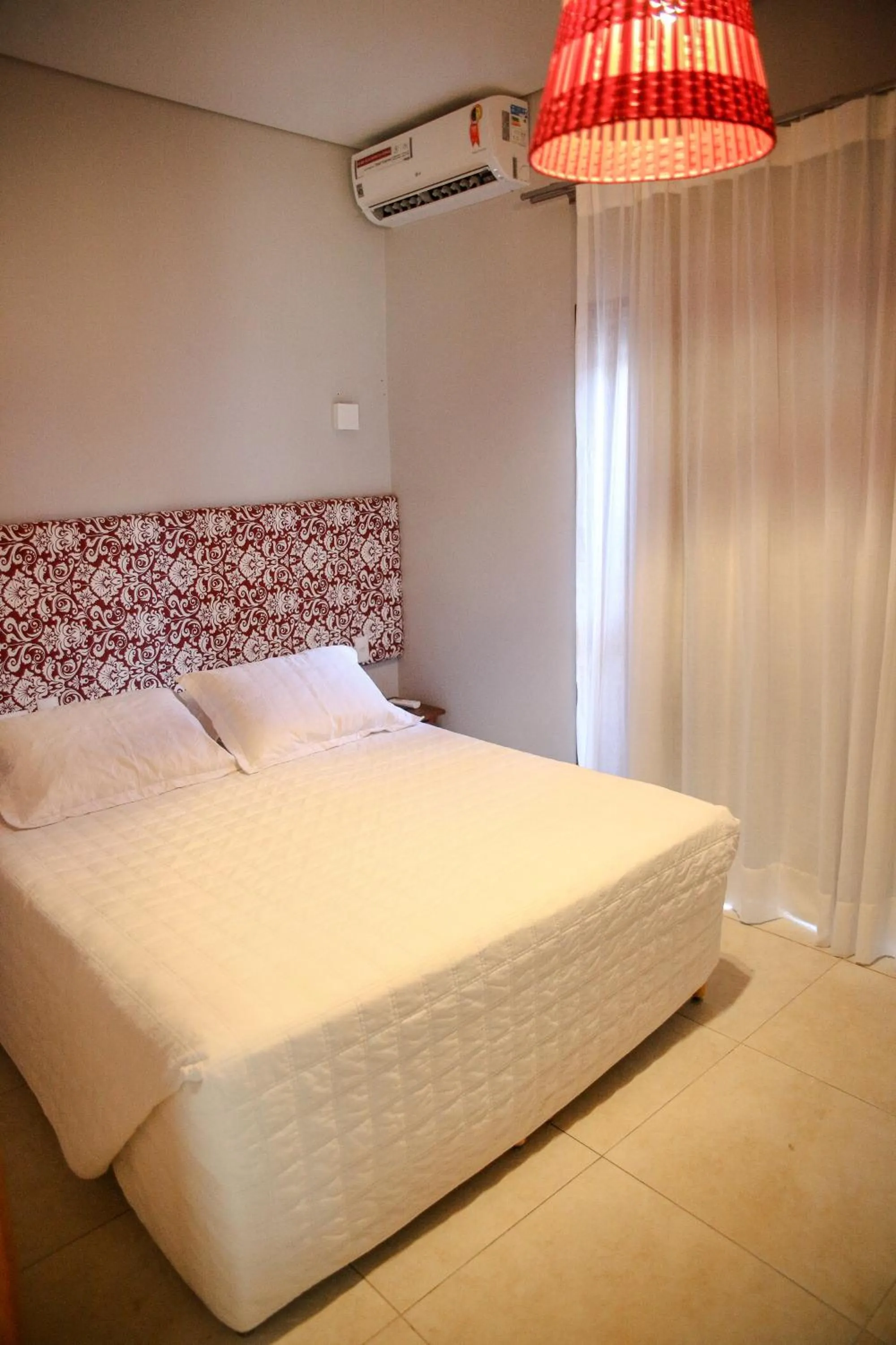 Bed in Pousada Nascer do Sol