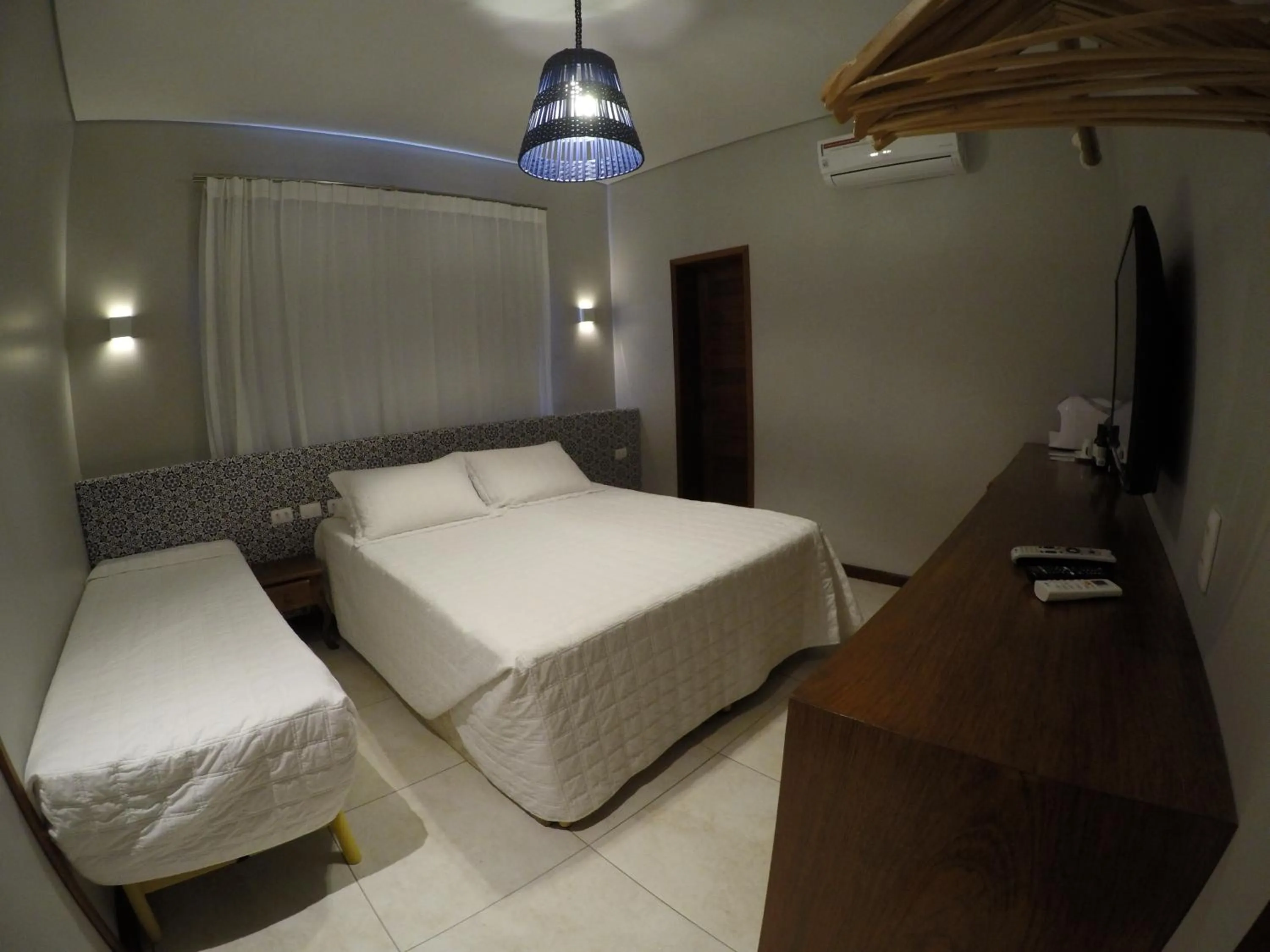 Bed in Pousada Nascer do Sol