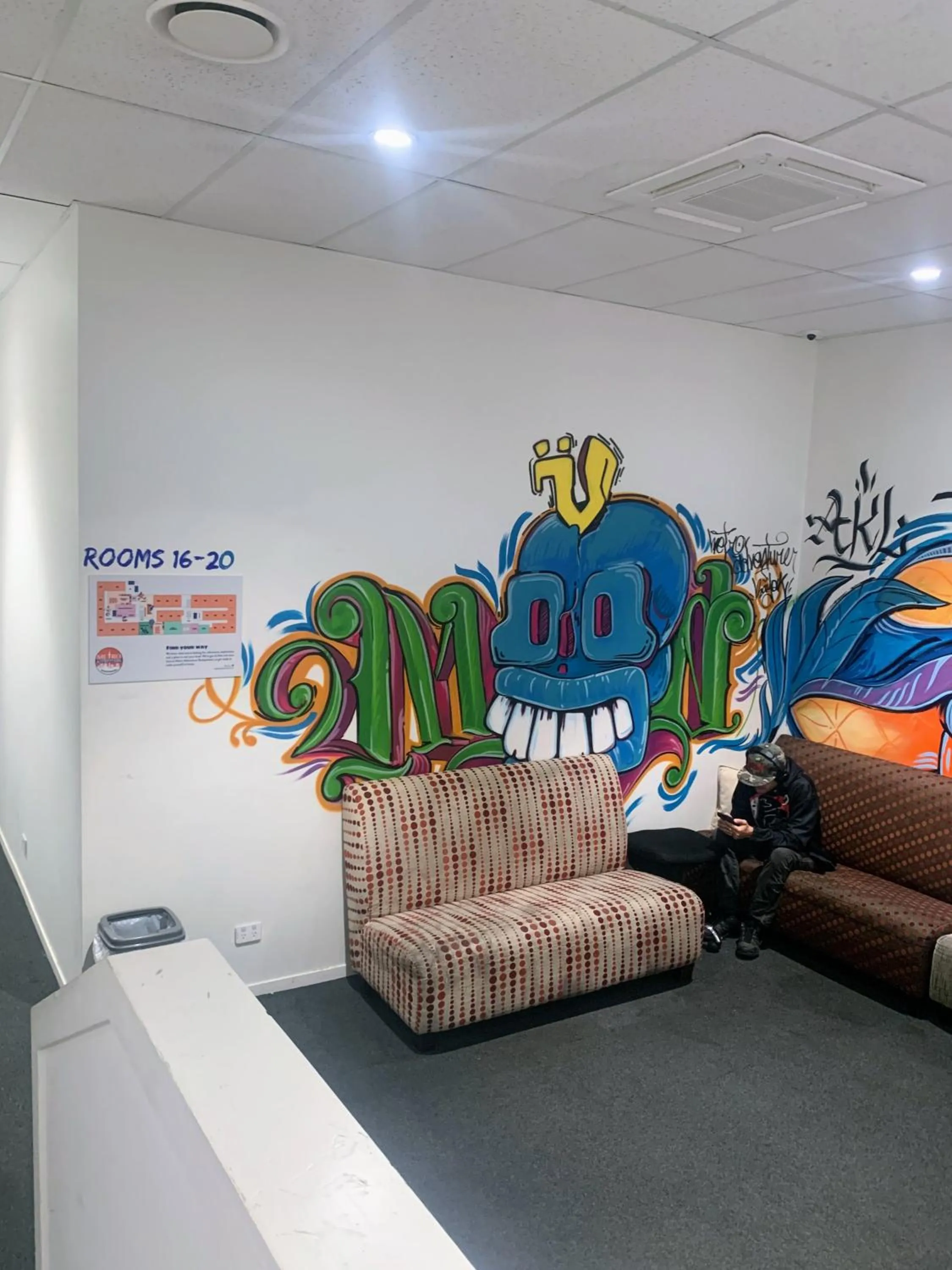 Communal lounge/ TV room in Metro Adventurer Backpackers