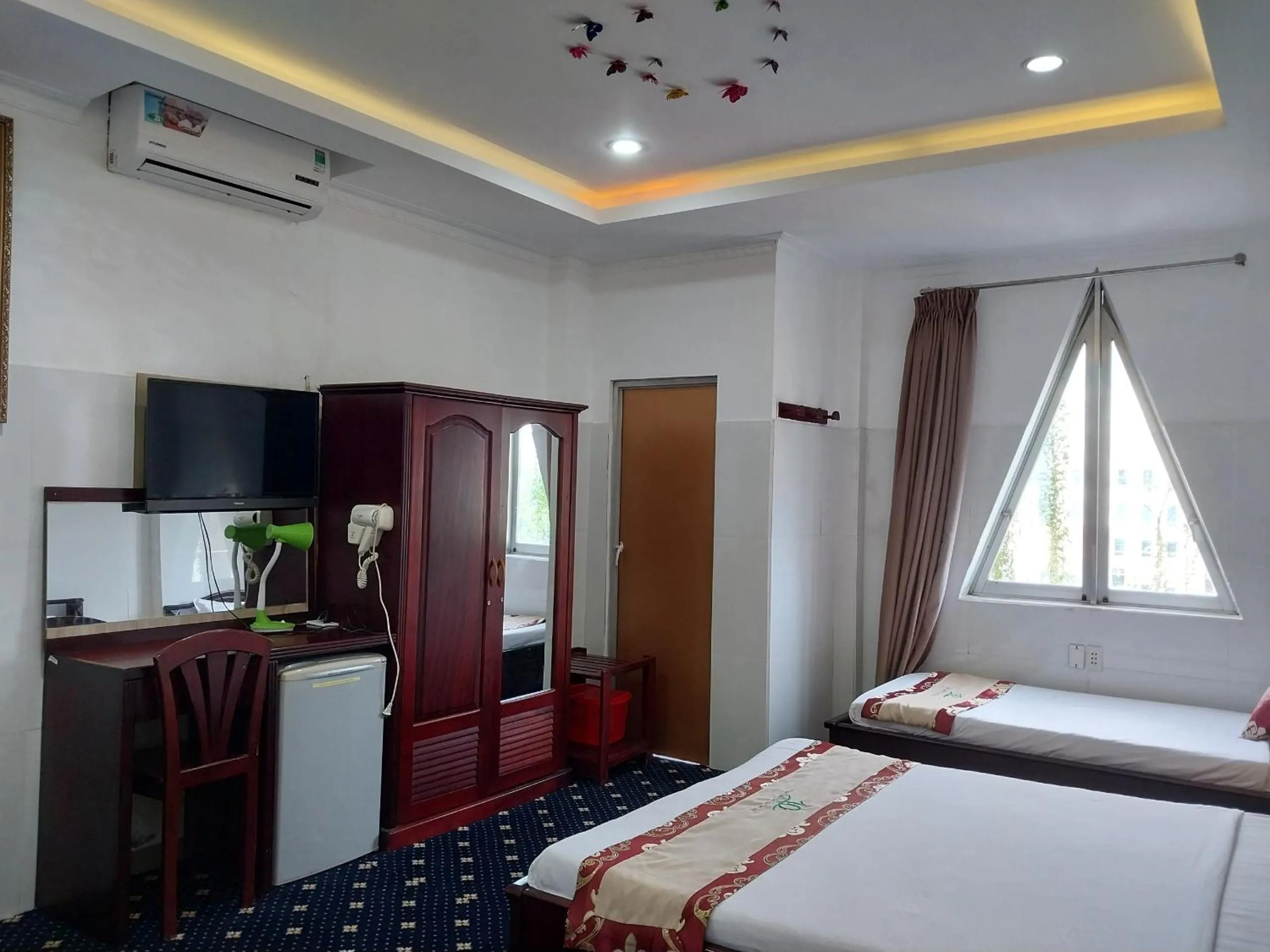 Bed in Nhat Quy Hotel