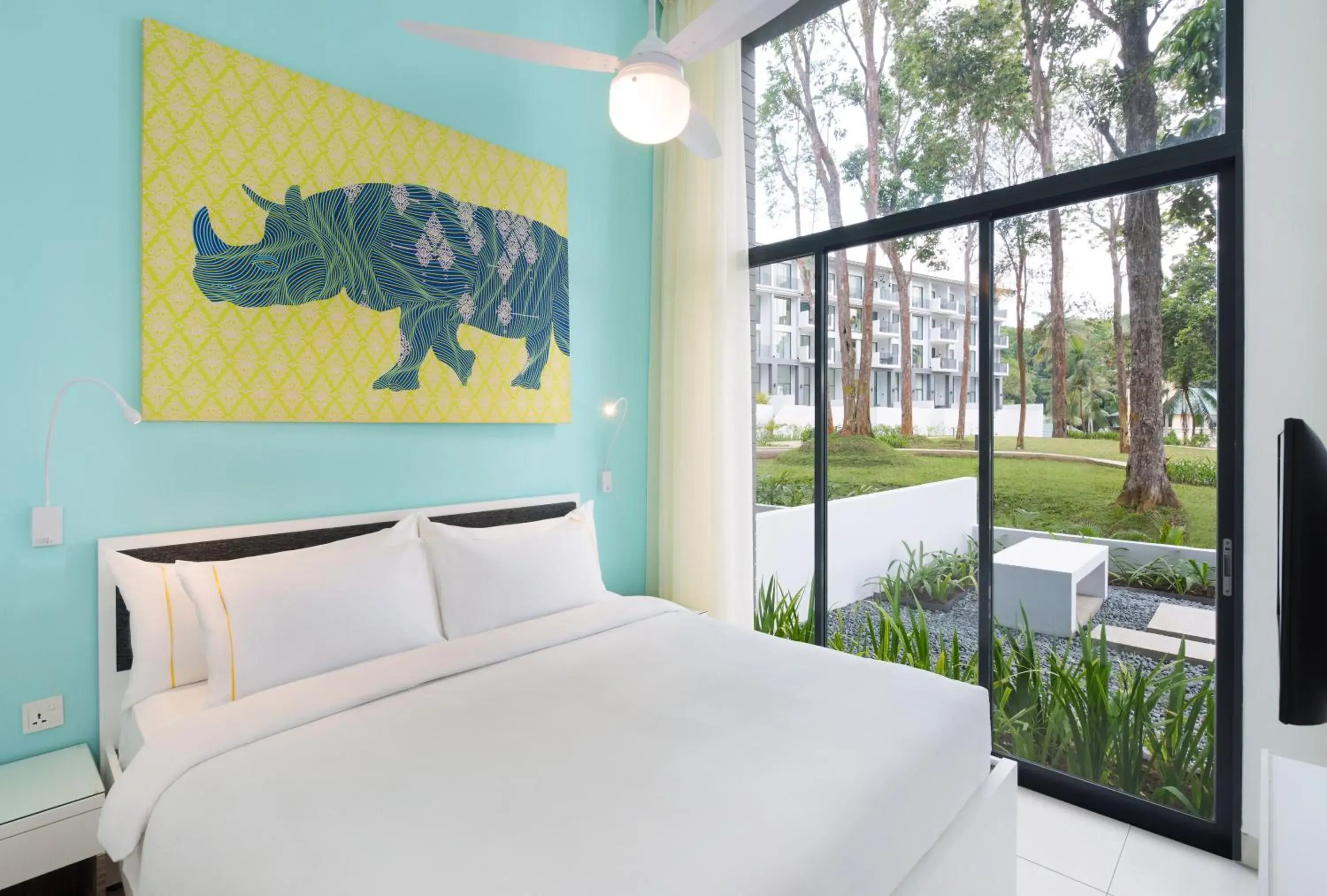 Bed in Cassia Bintan, part of Banyan Group Bed in Cassia Bintan, part of Banyan Group