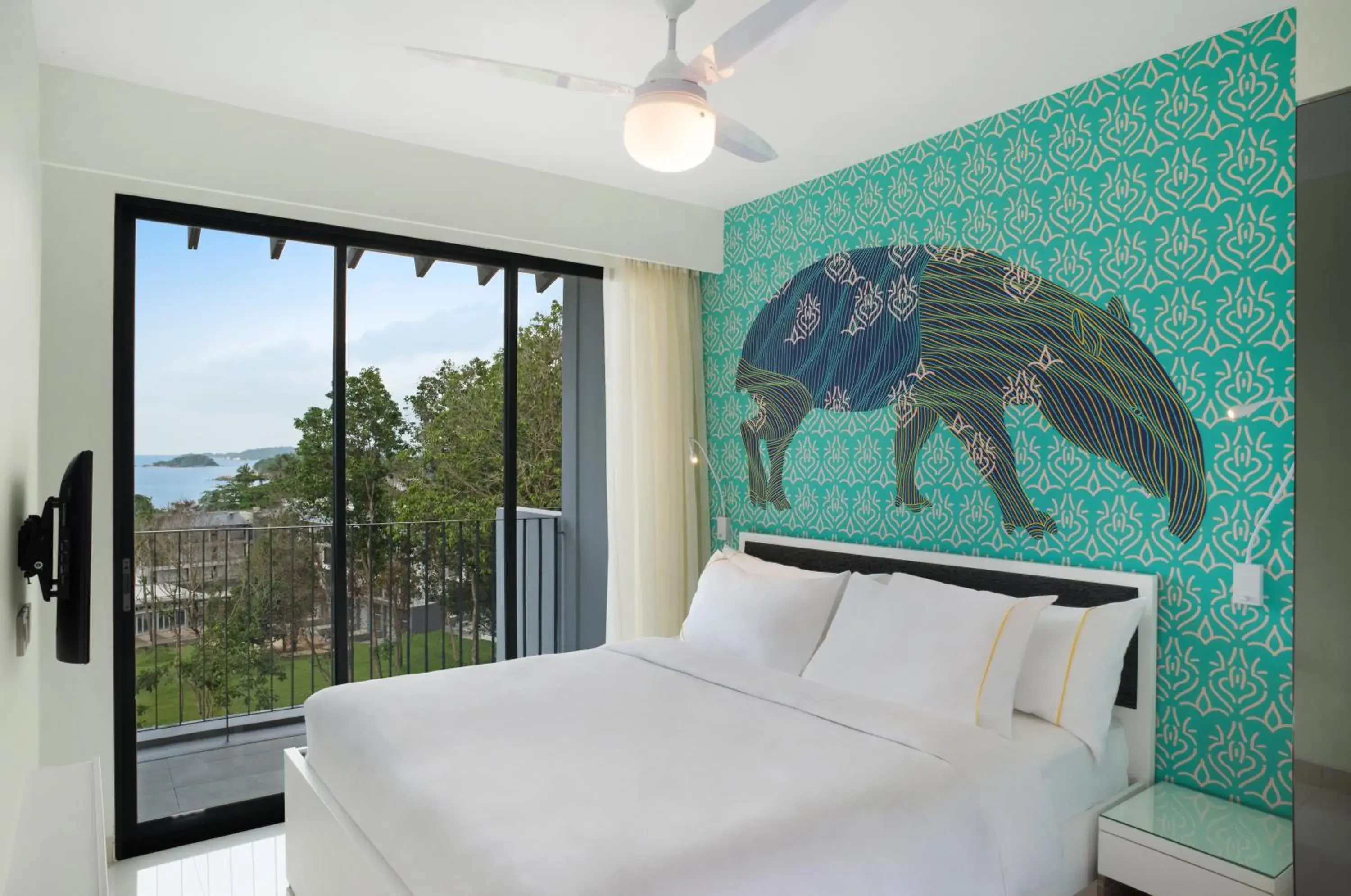 Bed in Cassia Bintan, part of Banyan Group Bed in Cassia Bintan, part of Banyan Group