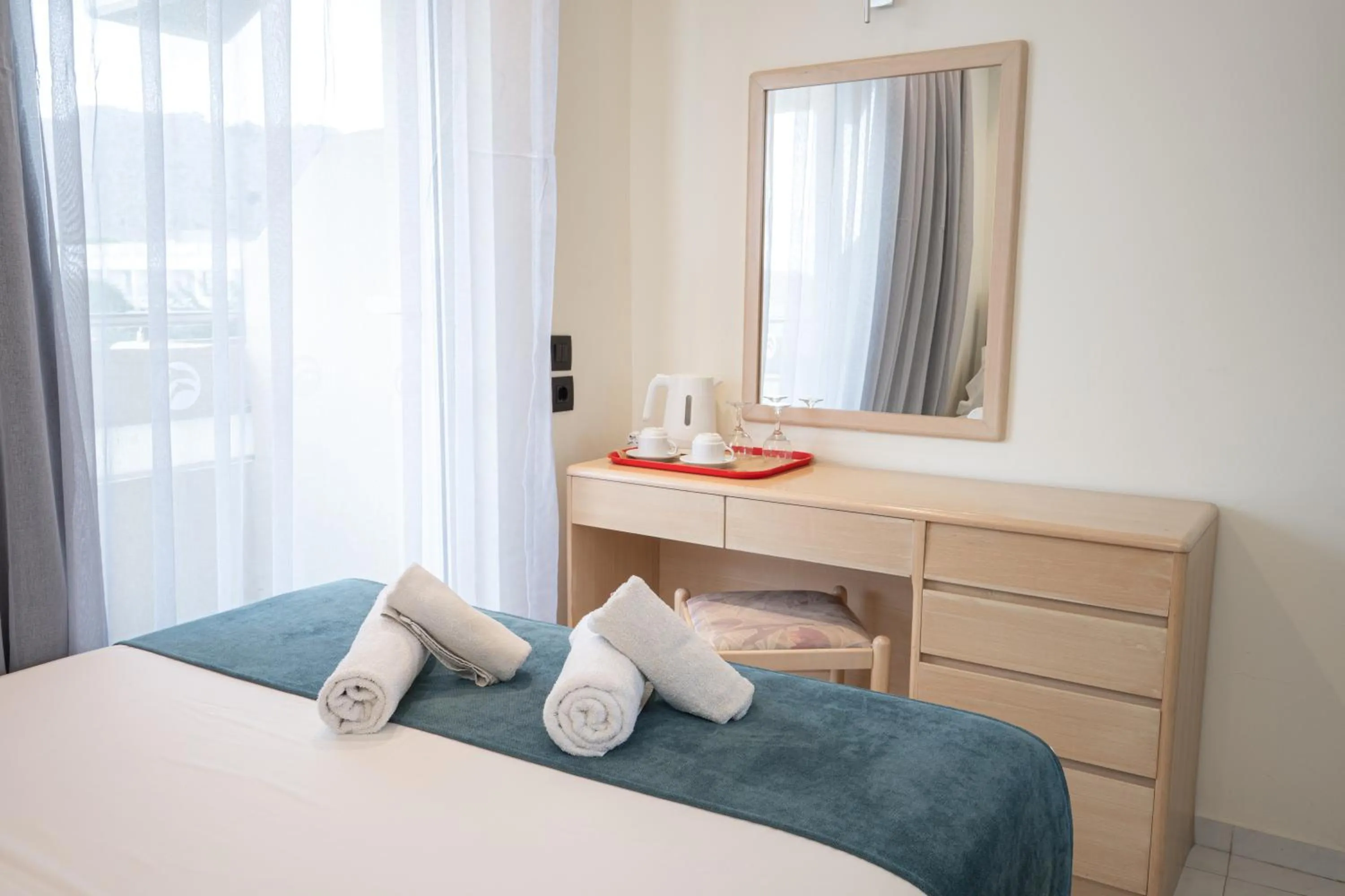 Bedroom, Bed in Delfinia Resort - All Inclusive