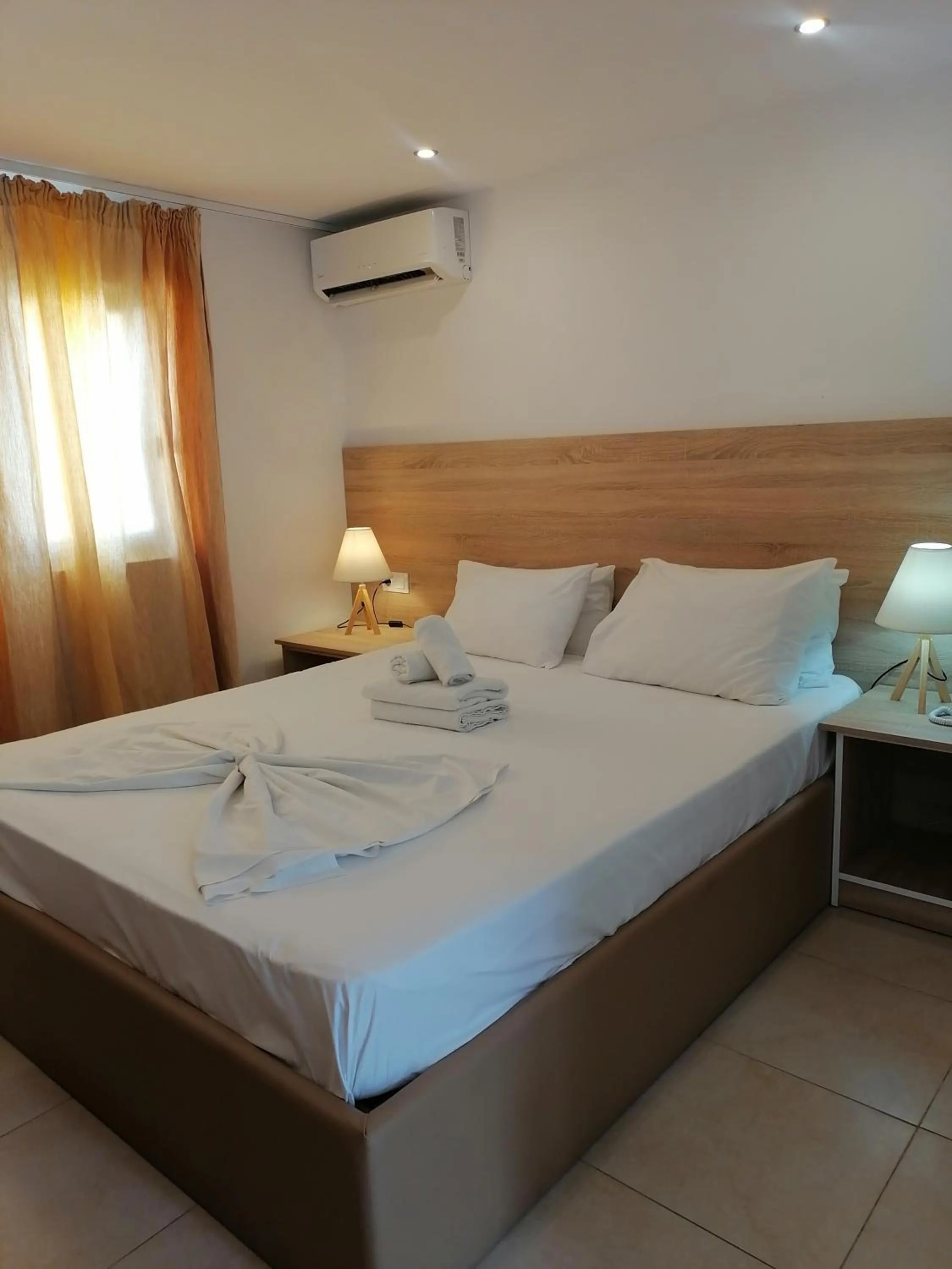 Bedroom, Bed in Delfinia Resort - All Inclusive