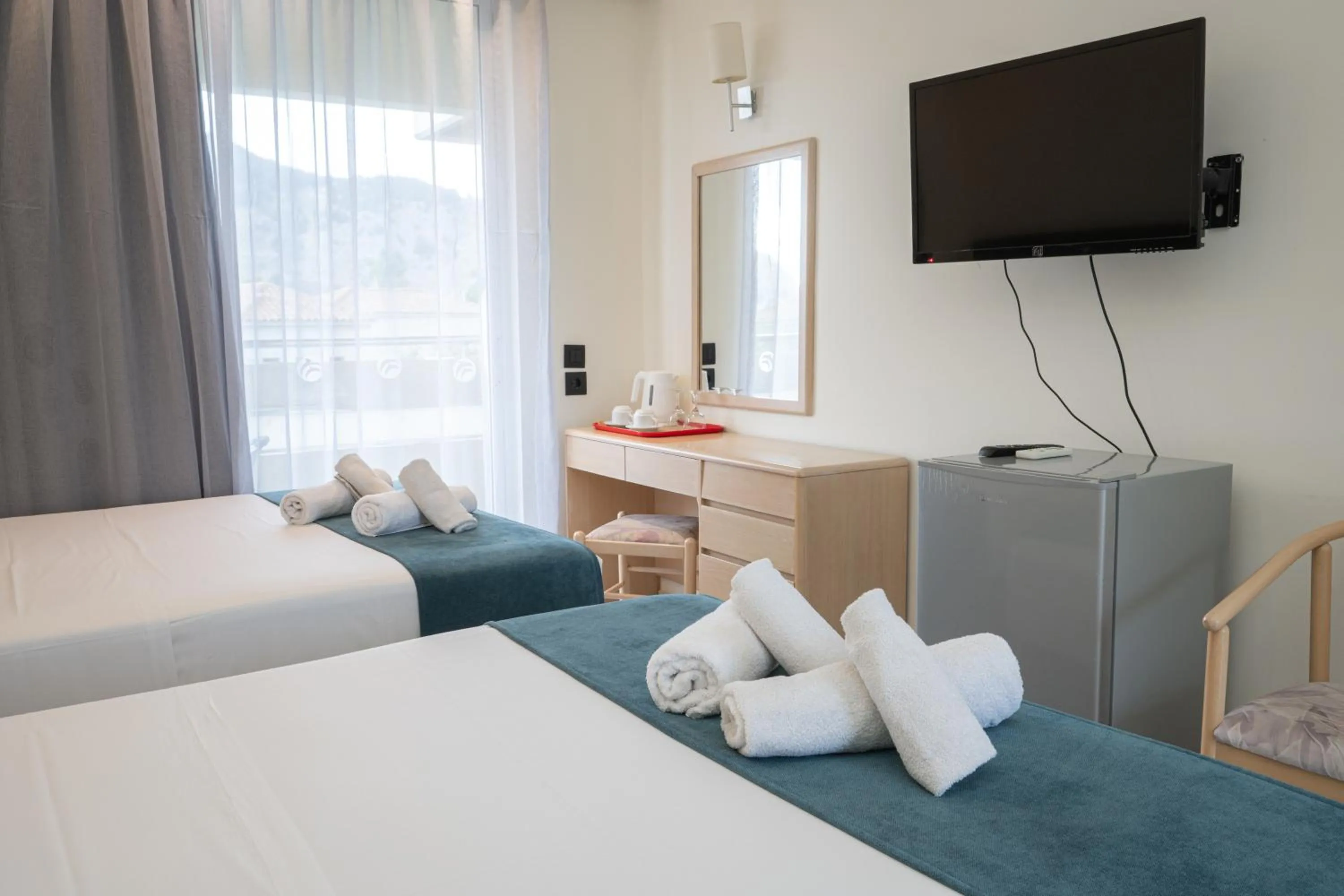 Bedroom, Bed in Delfinia Resort - All Inclusive