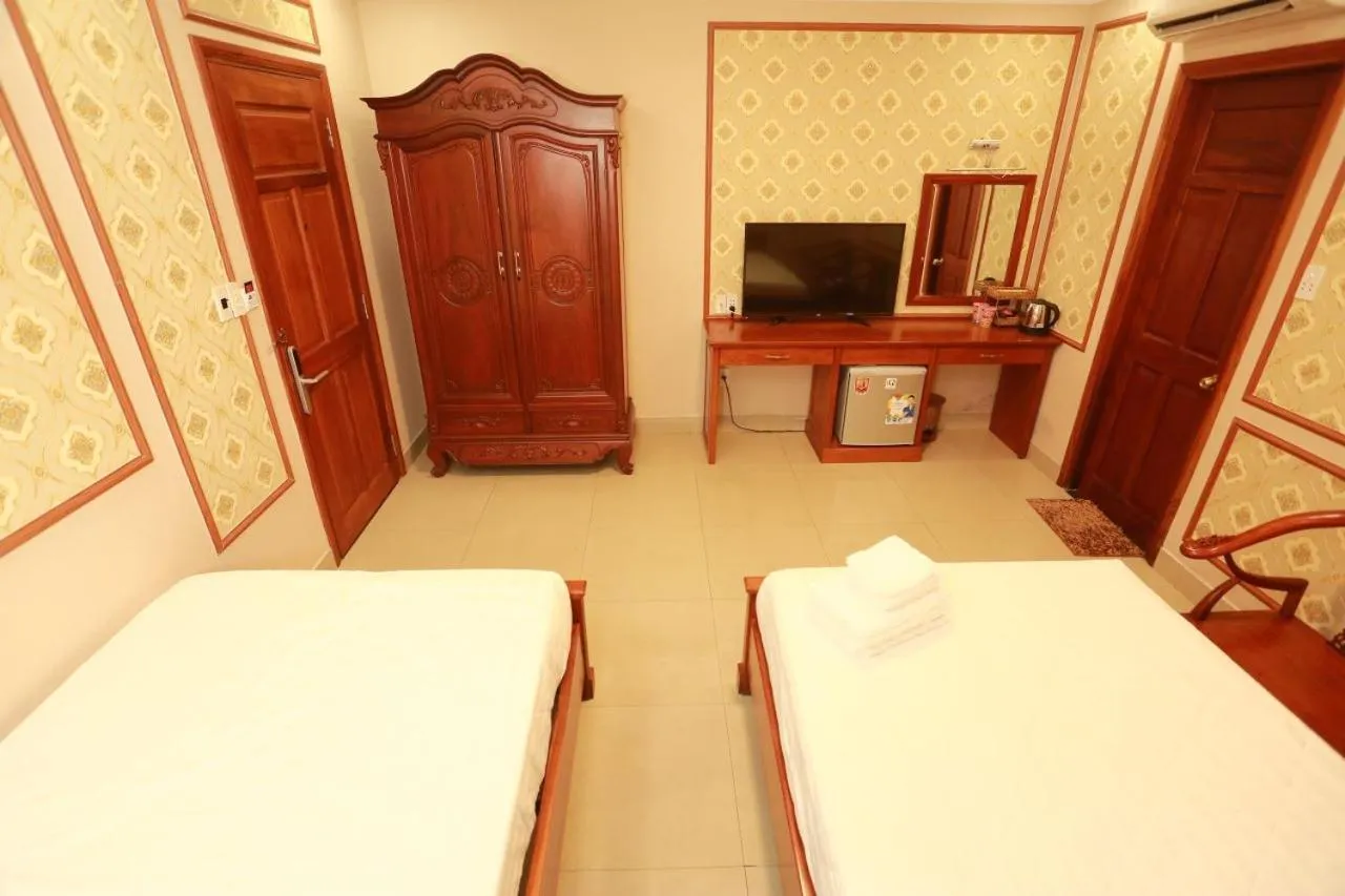 Bed in THANH TAI HOTEl 1