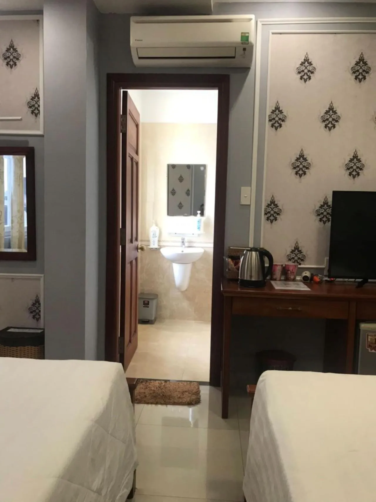 Bed in THANH TAI HOTEl 1