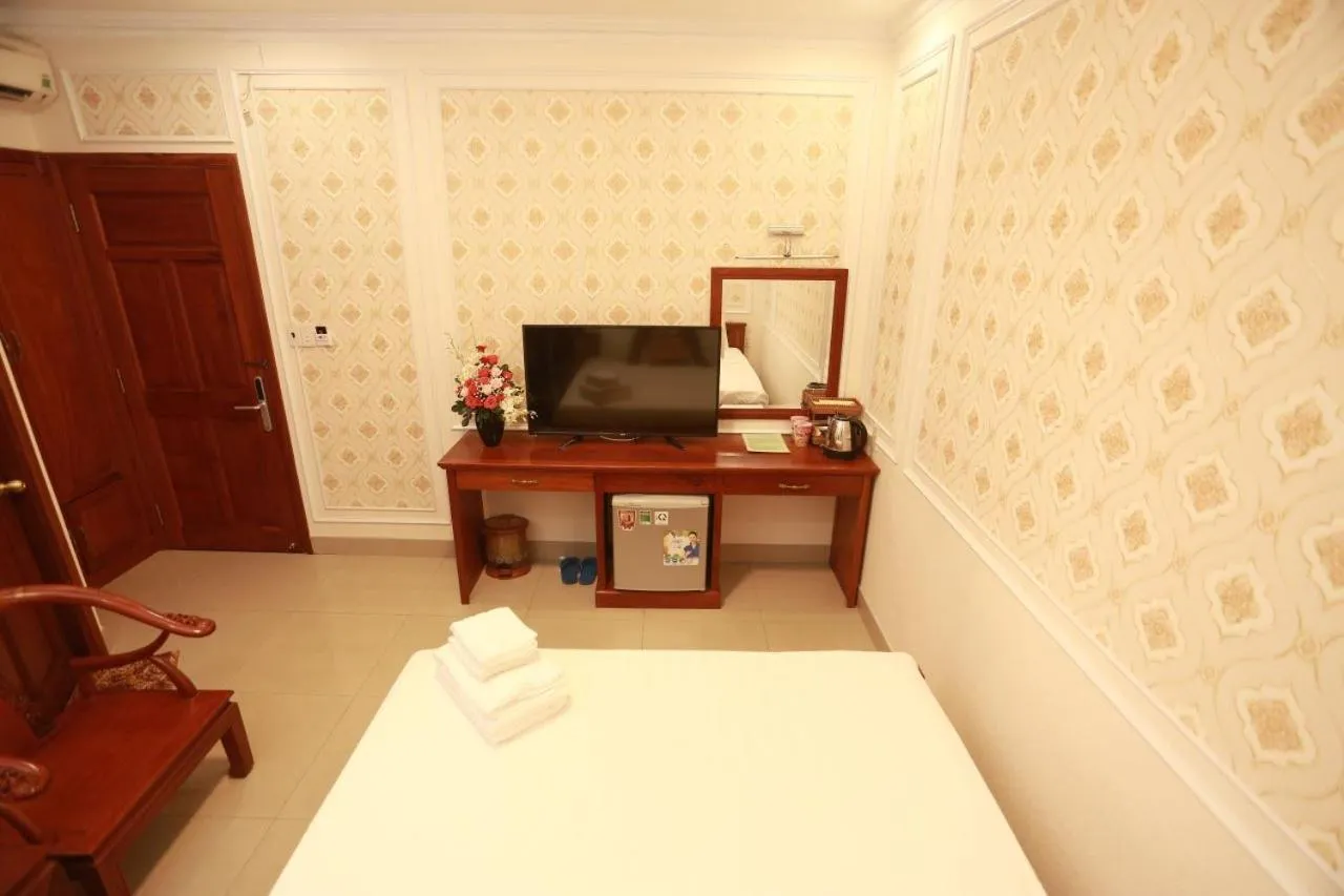 Bed in THANH TAI HOTEl 1