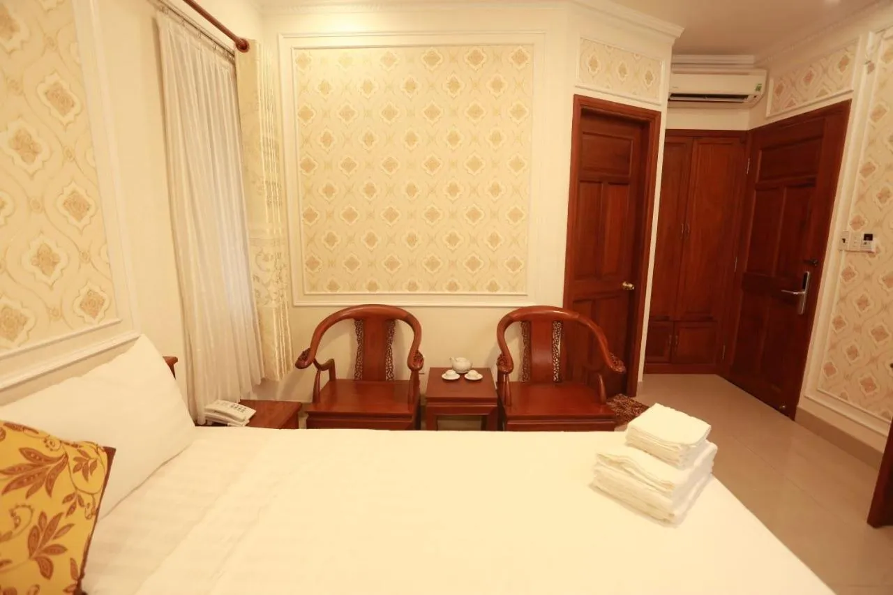 Bed in THANH TAI HOTEl 1