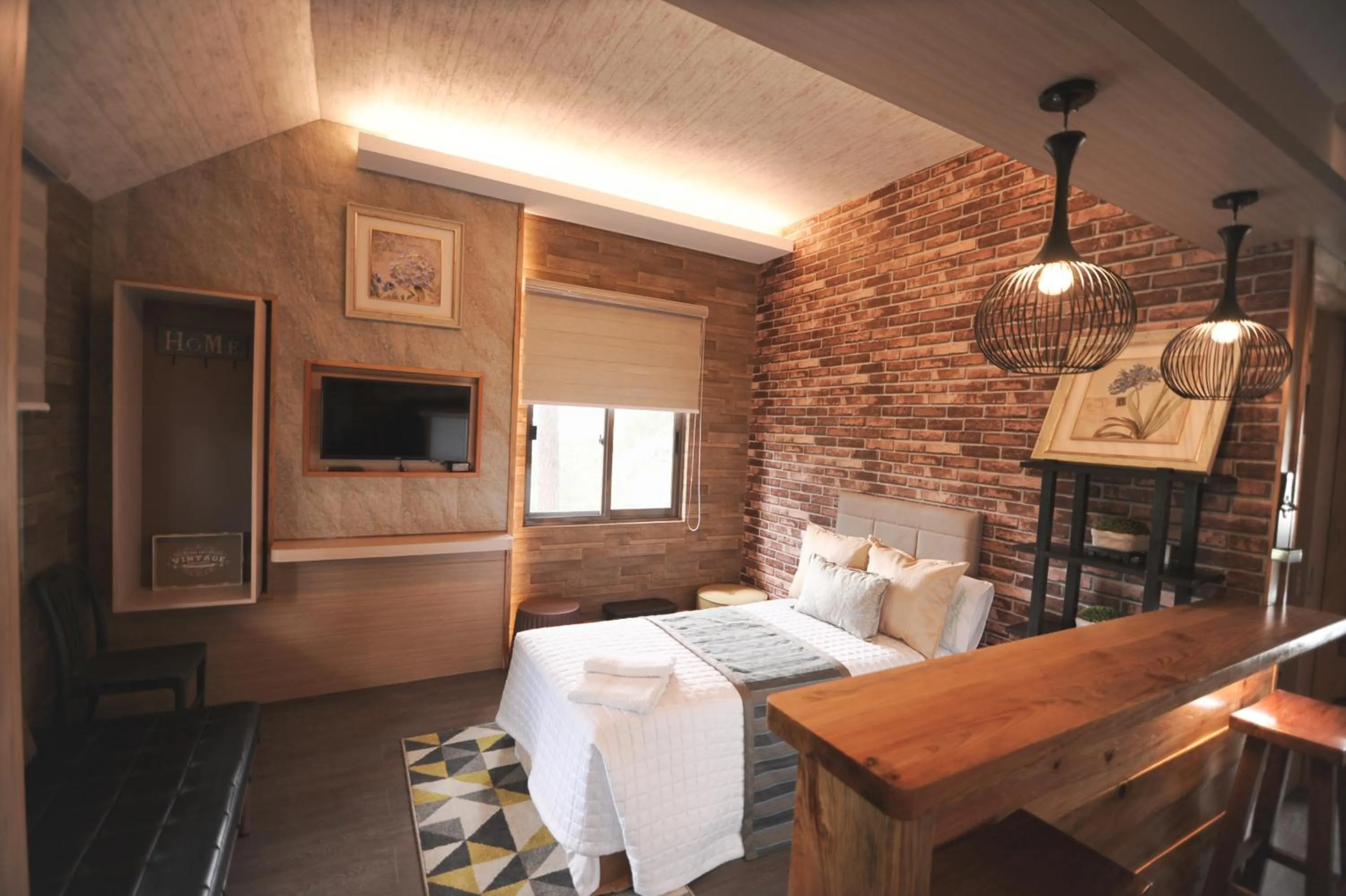 Bed in Pine Breeze Cottages