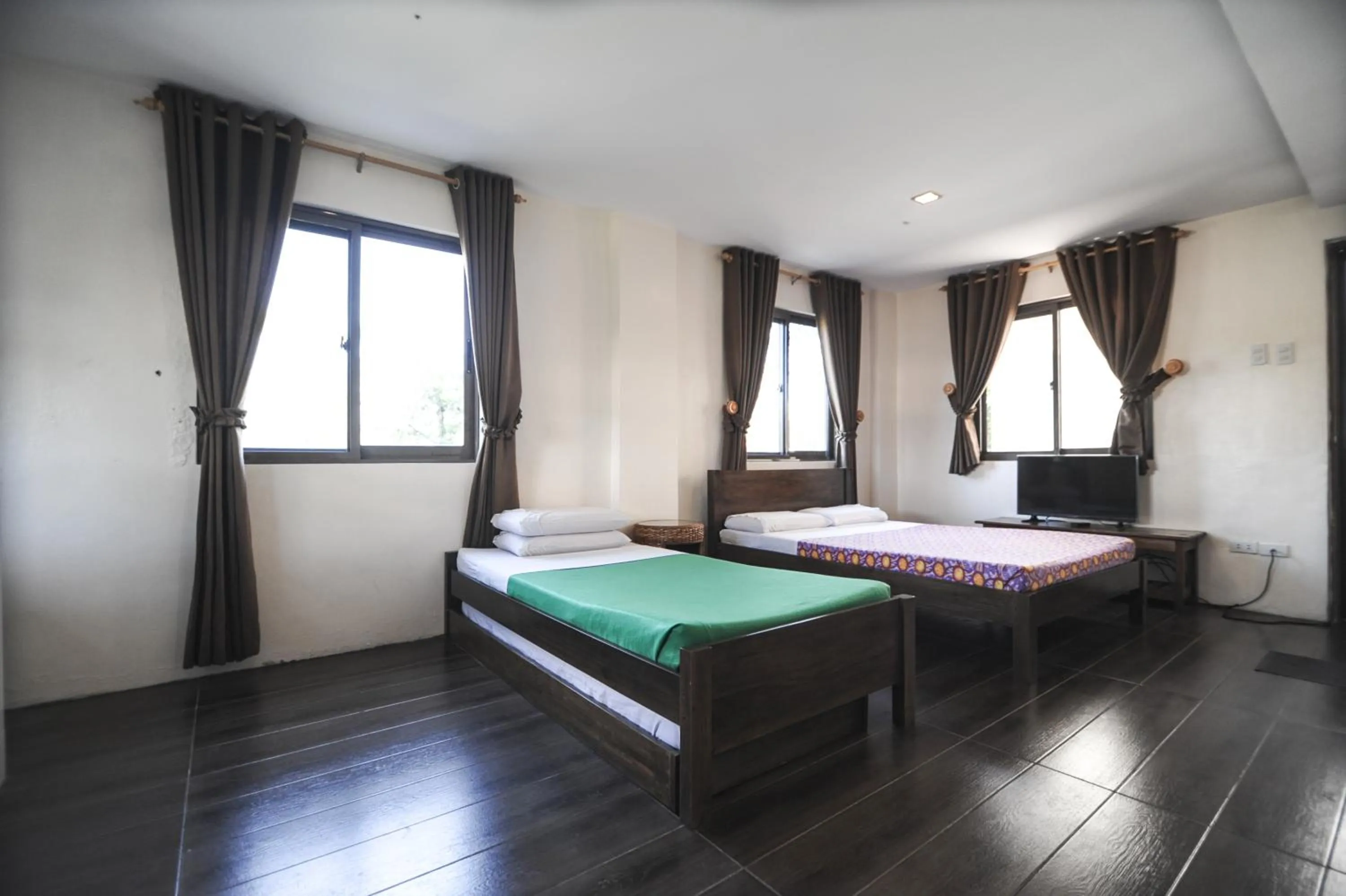 Bed in Pine Breeze Cottages