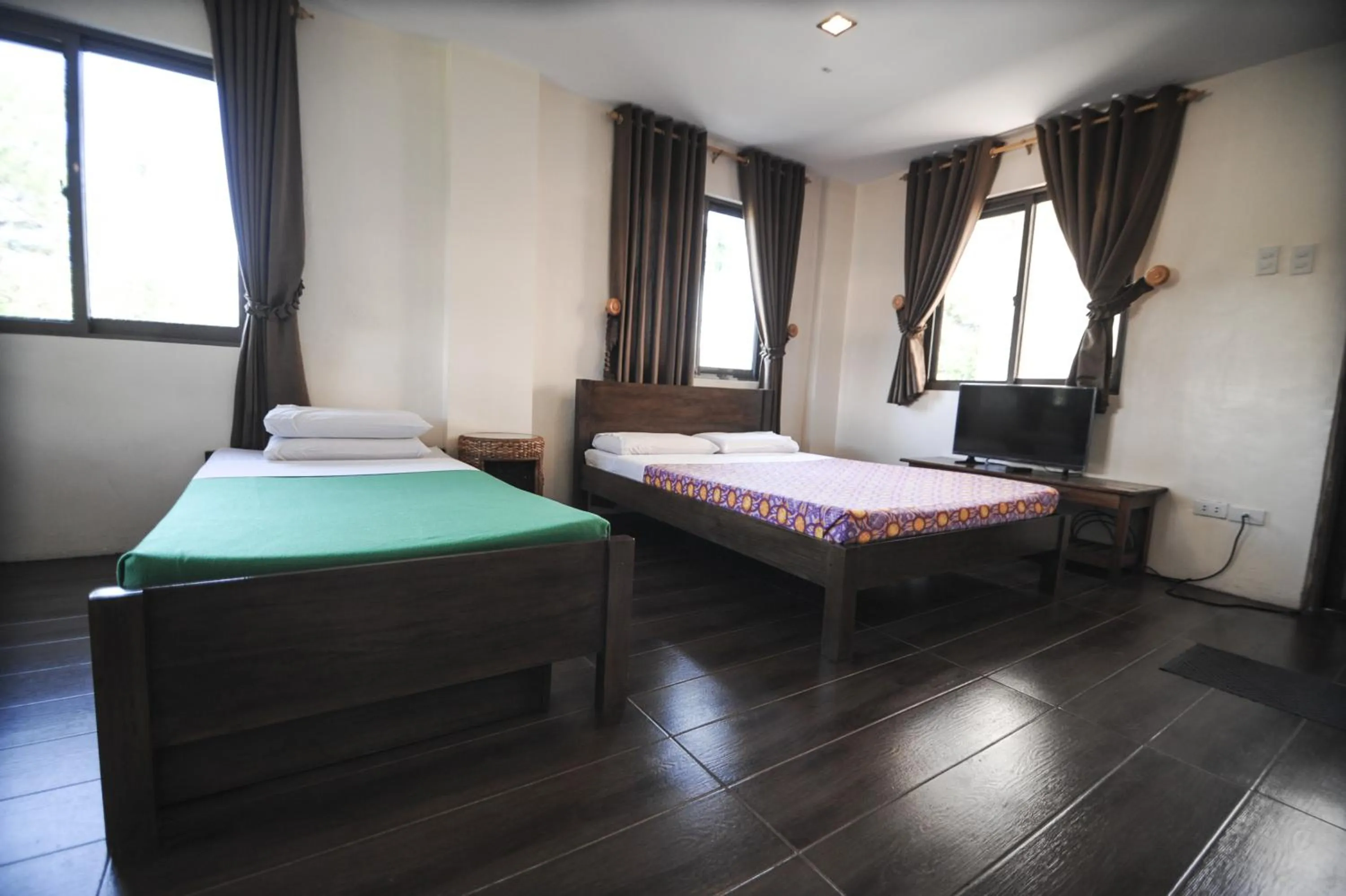 Bed in Pine Breeze Cottages