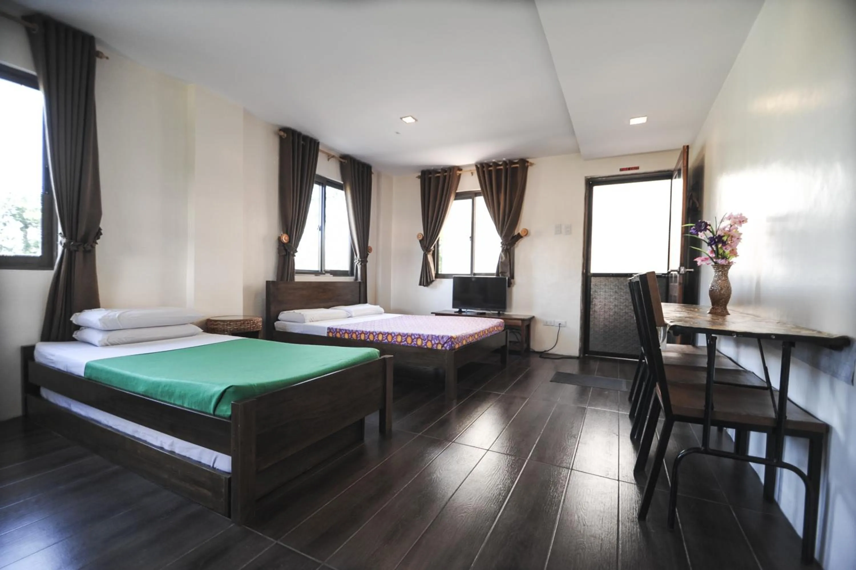 Bed in Pine Breeze Cottages