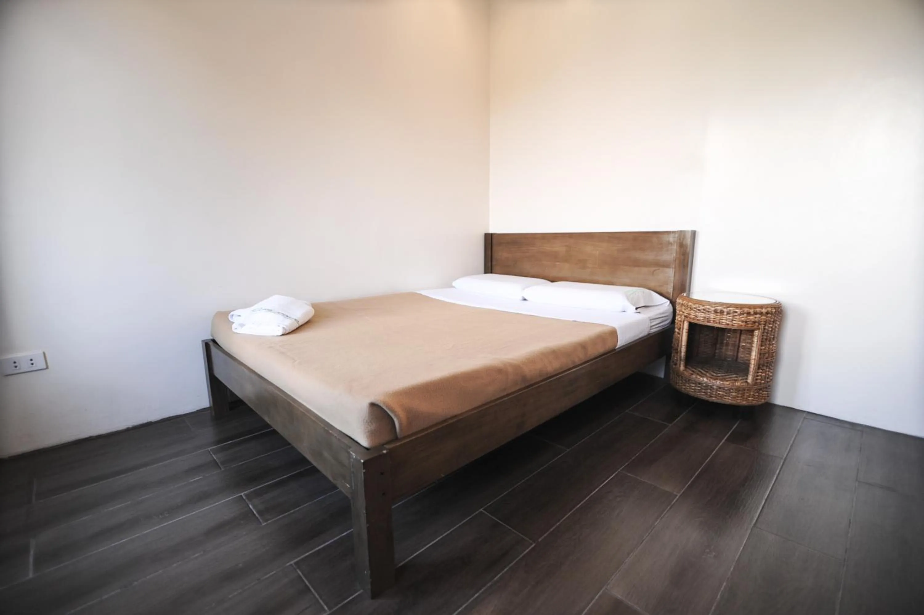 Bed in Pine Breeze Cottages