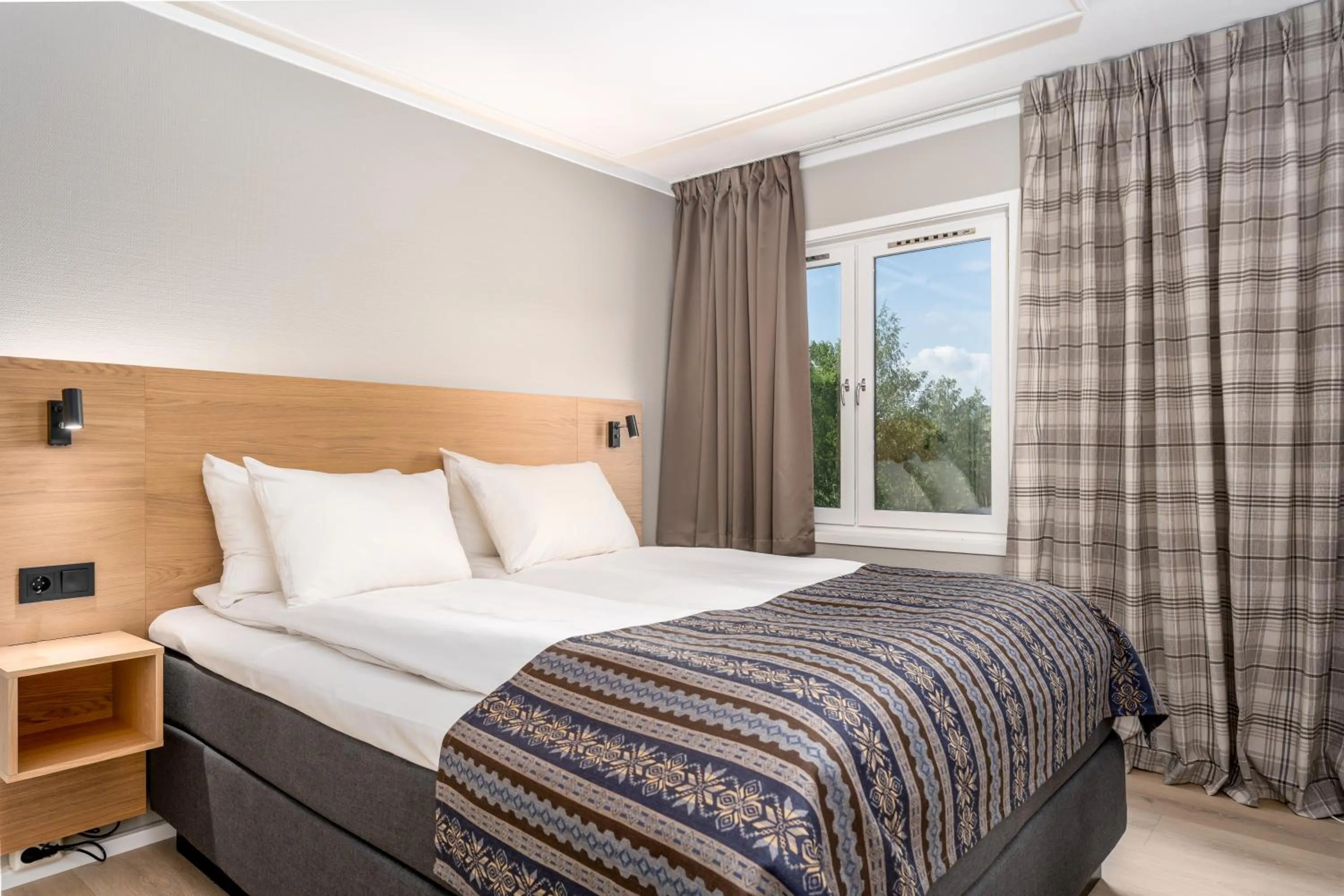 Bed in Birkebeineren Hotel & Apartments