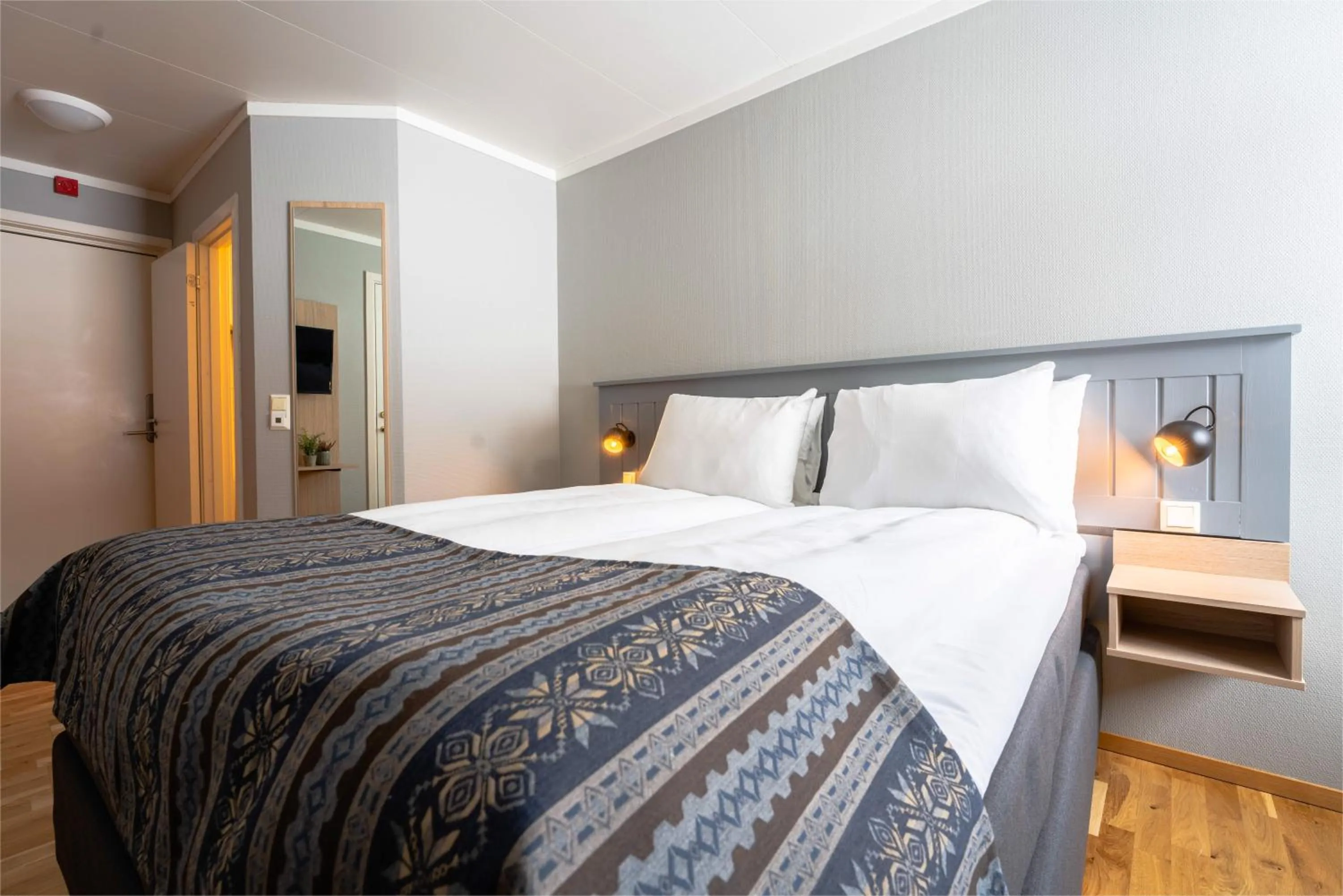 Bed in Birkebeineren Hotel & Apartments