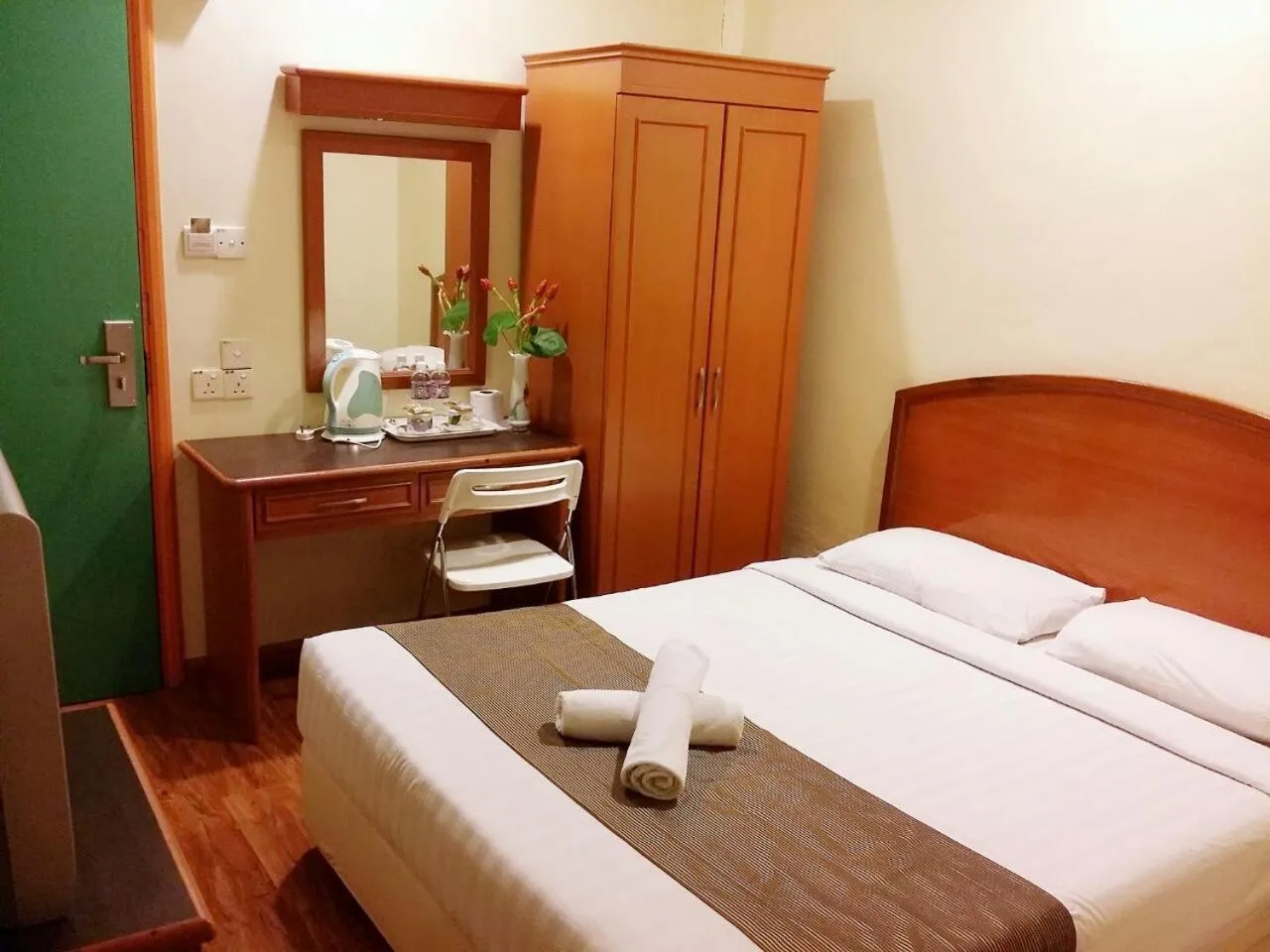 Bed in SkyGlobal Hotel